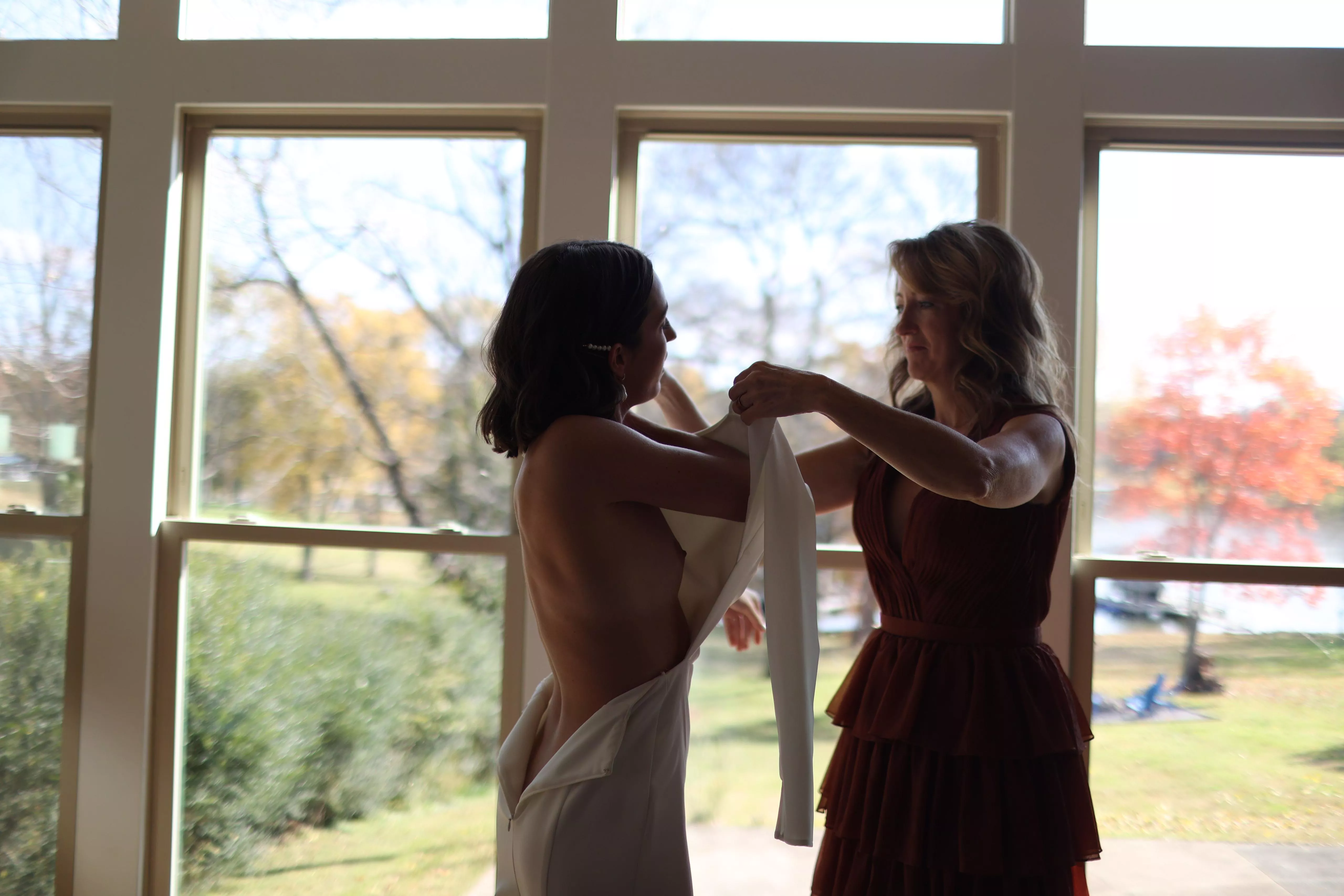 Mom helping with the dress.