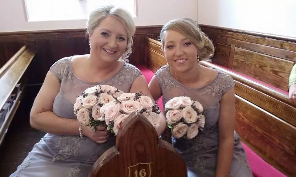 Mother and daughter bridesmaids