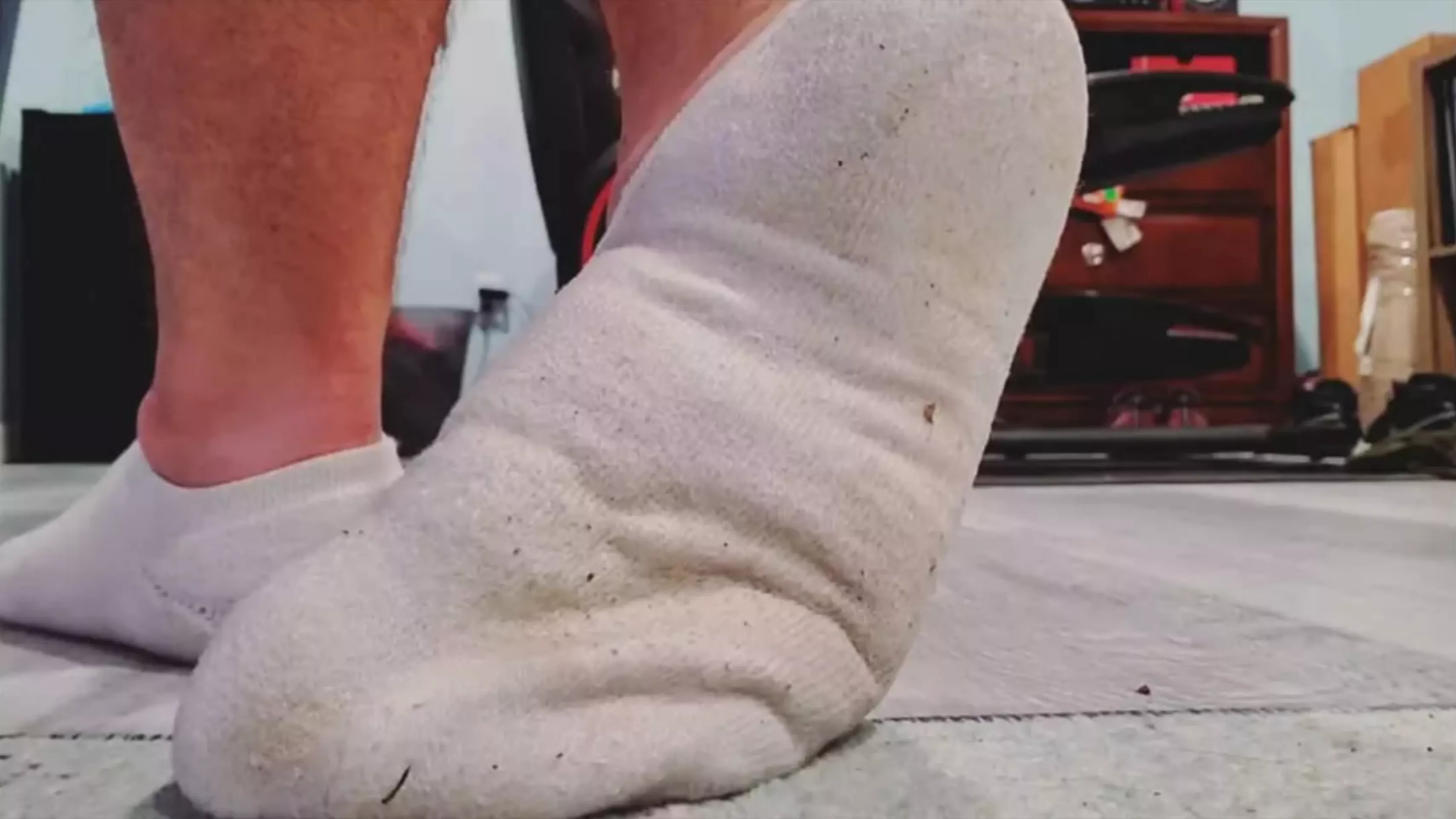 My dirty, sweaty white socks ripe with my foot scent