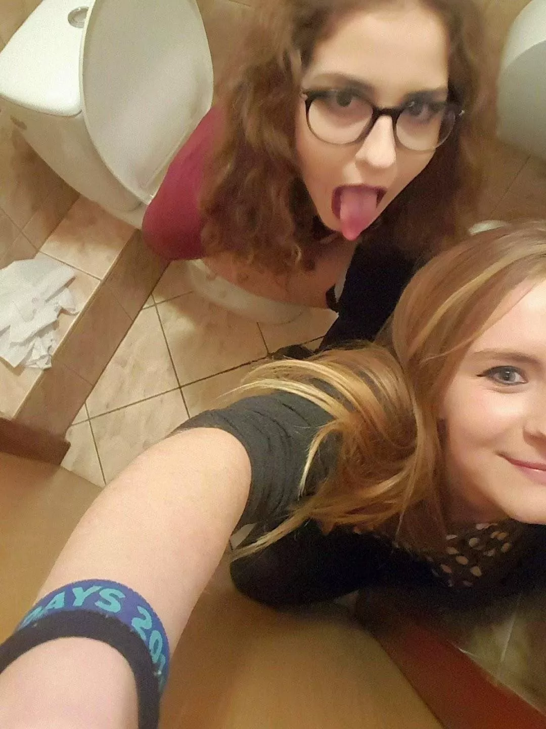 My [F21]Girlfriend and her [F22]Friend taking drunken selfie in the toilet.