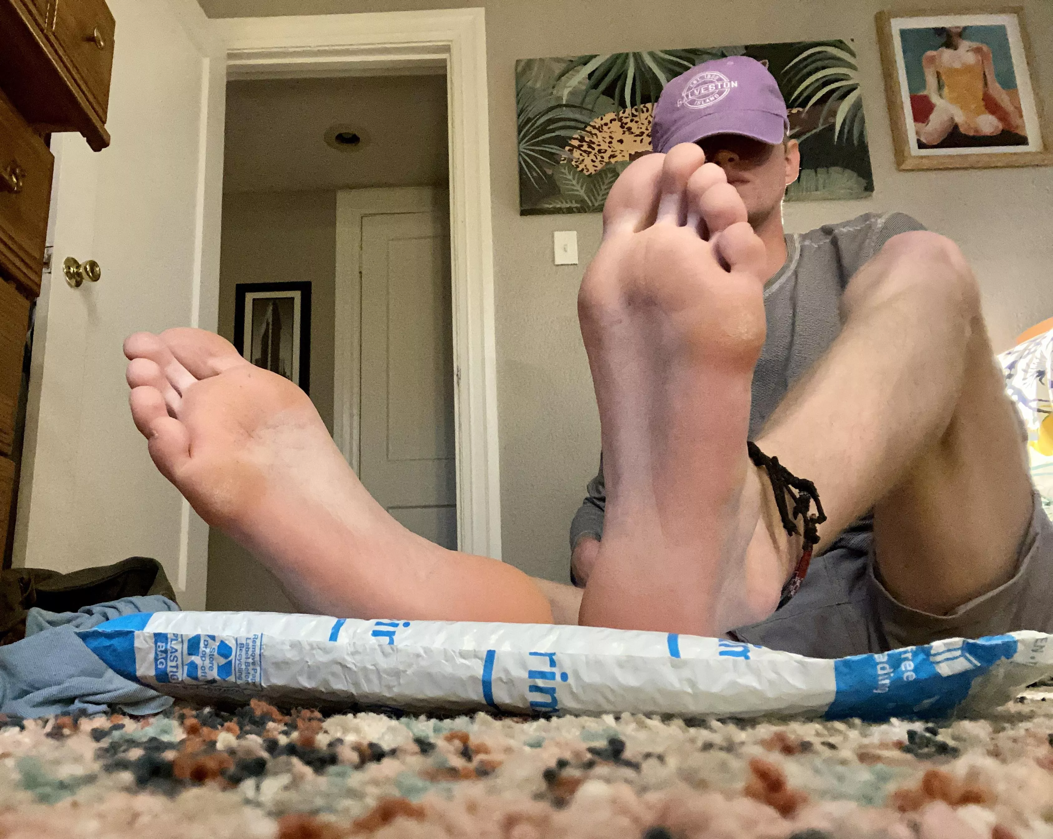 My favorite poseâ€¦feet over a new Amazon package filled with something from a sub. I love it.