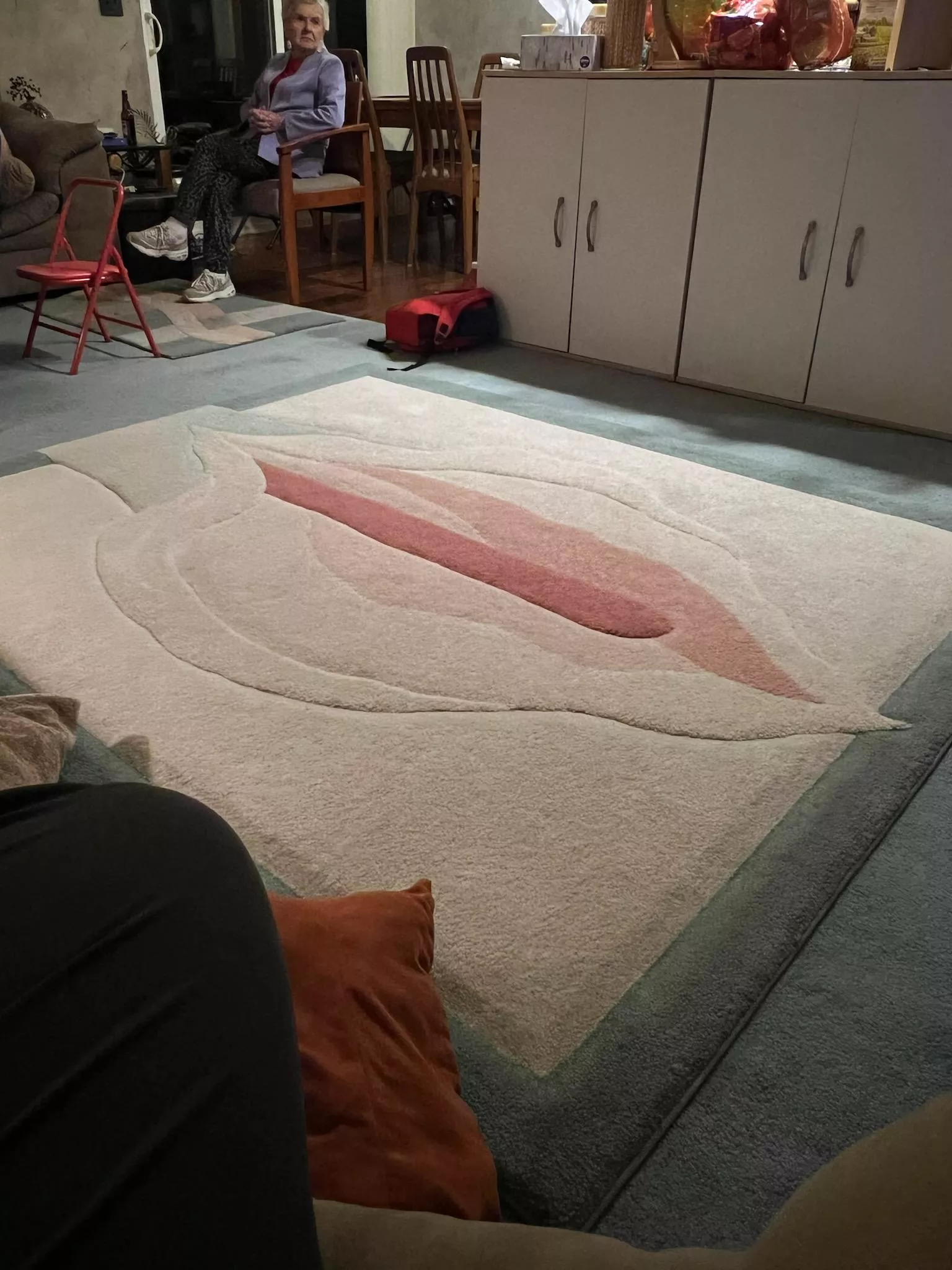 my friends in laws are so very proud of their flower rug