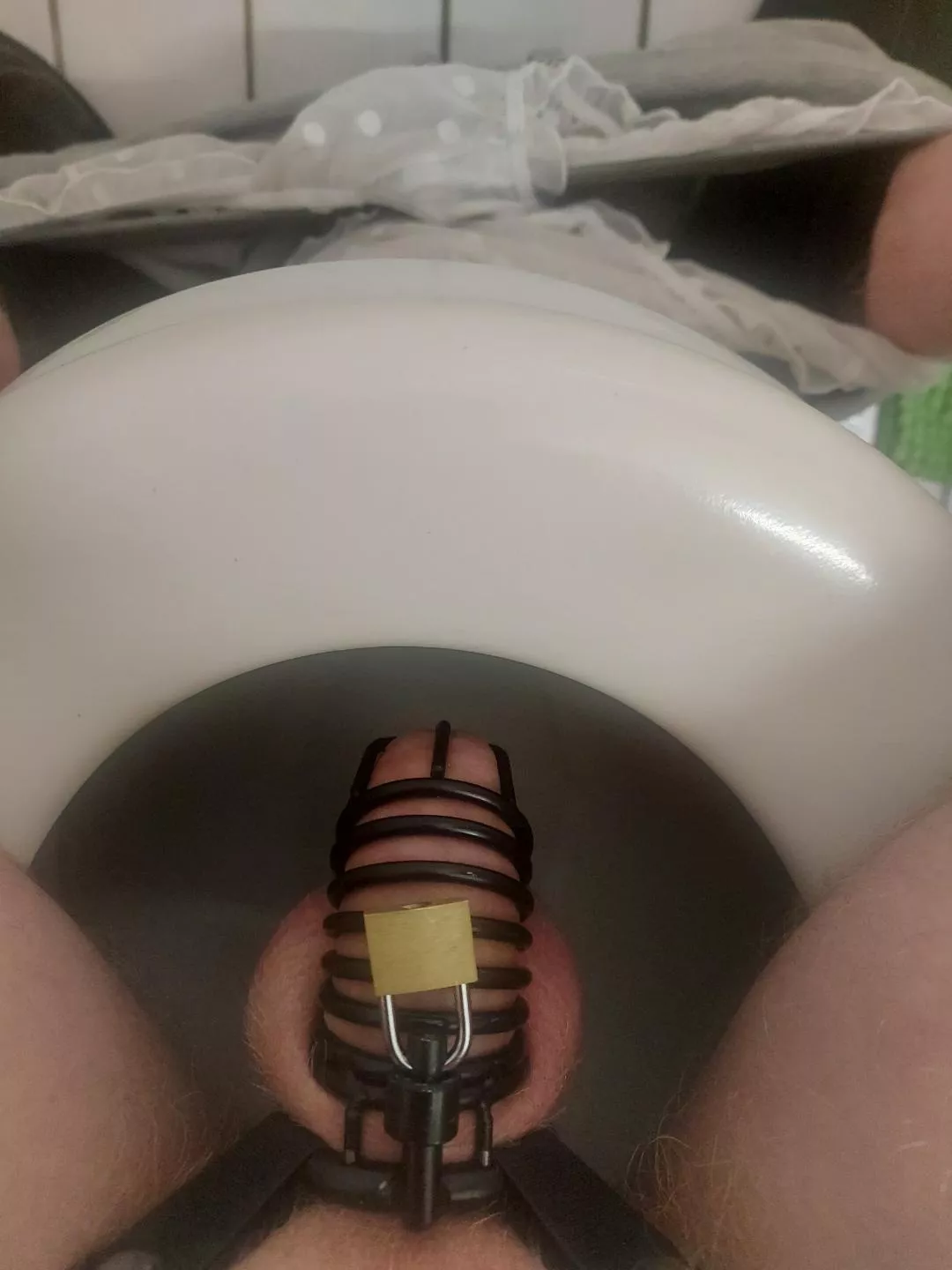 My girlfriend put me in chastity and won't release me before her birthday (which is in 1,5 weeks). Being forced to sit down while peeing, the view of my sissy panties on my ankles and not being able to properly clean my sissy clitty are still so humilia