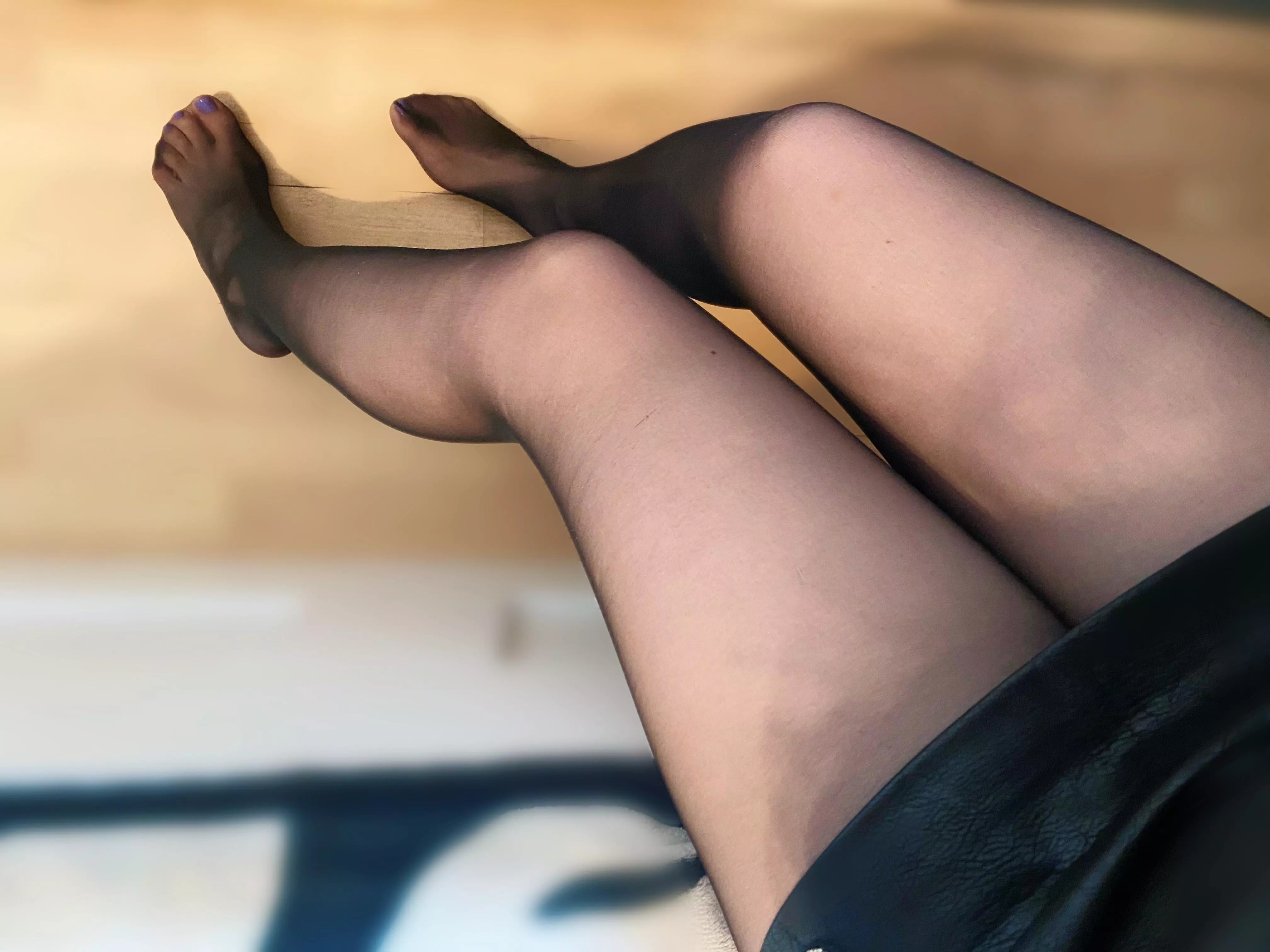 My legs in black pantyhose