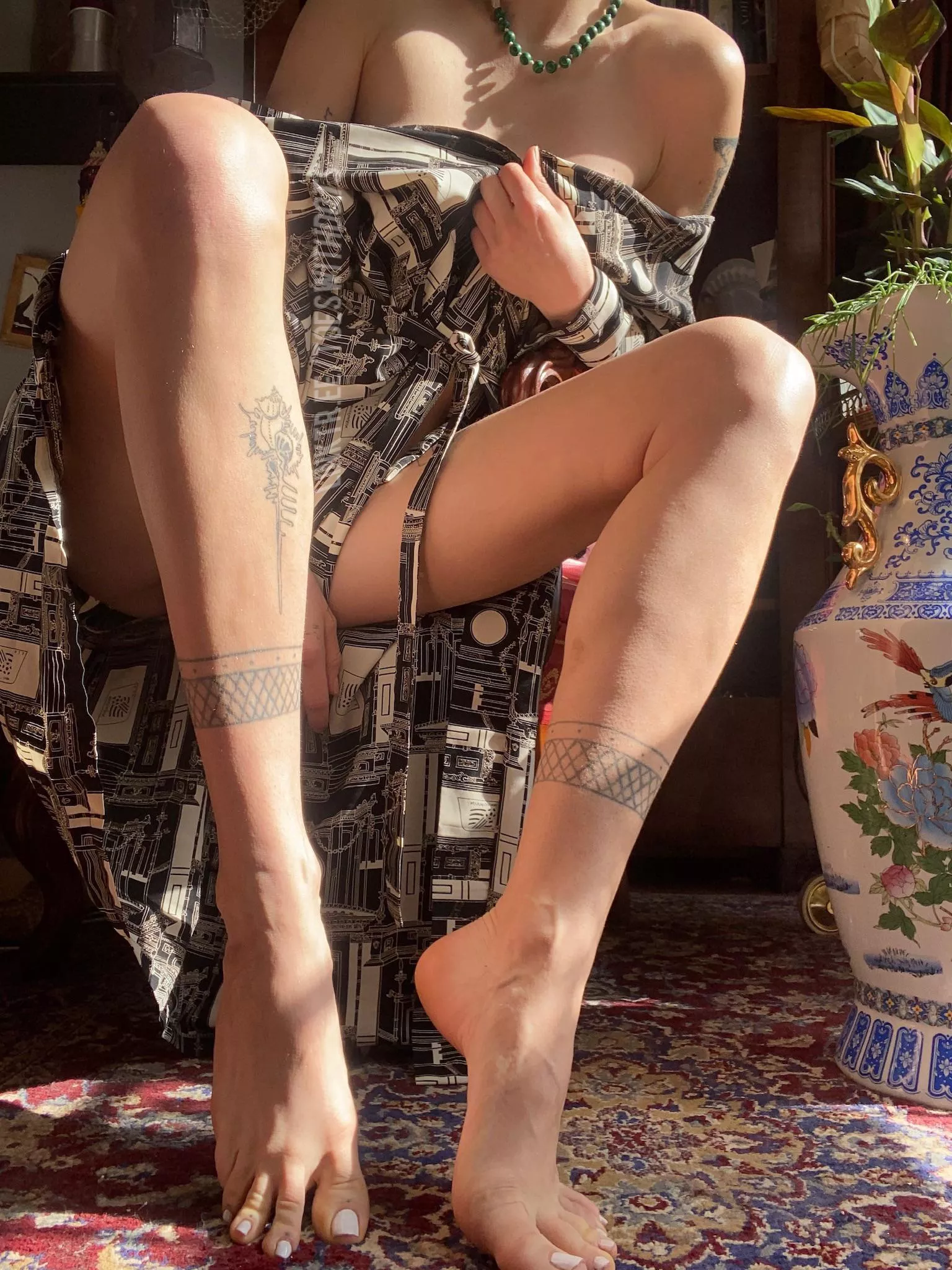 My long tattooed legs in the sun