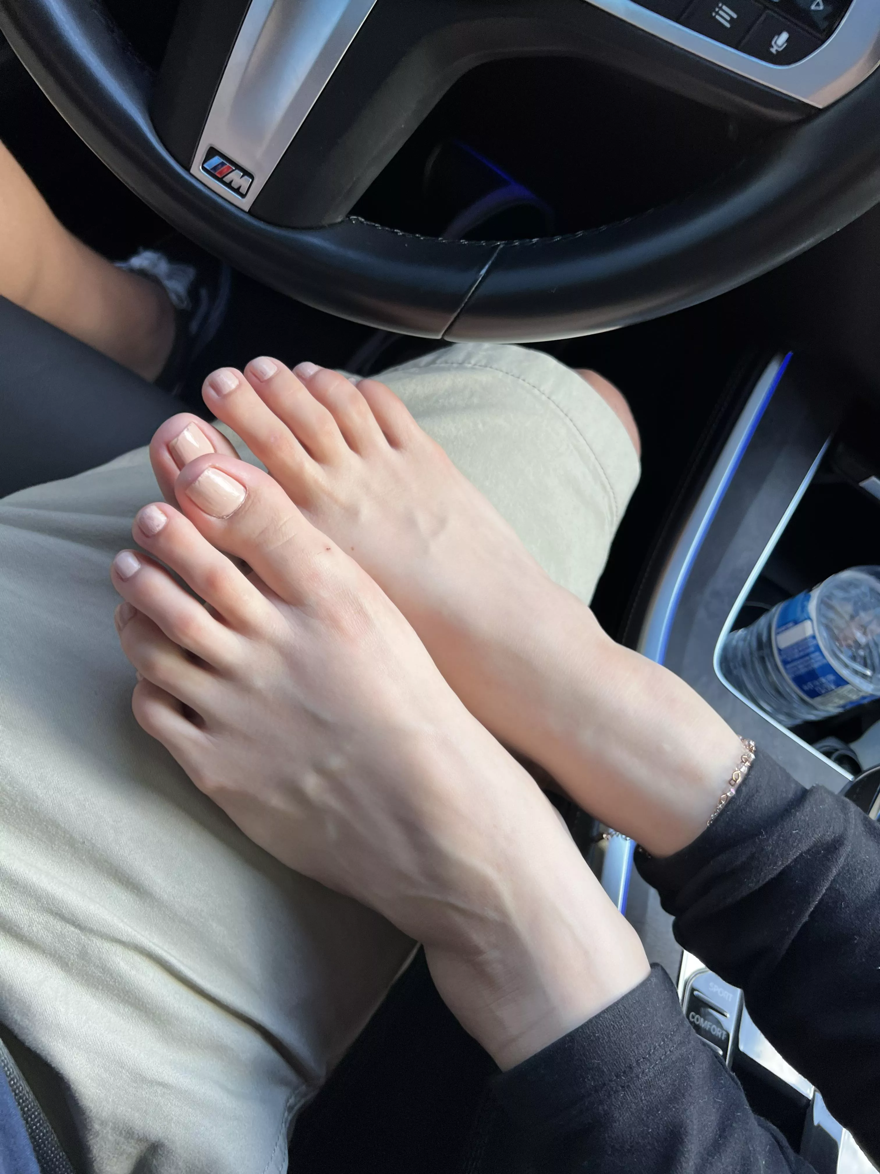 My wife Resting her gorgeous feet on me while I drive ðŸ˜