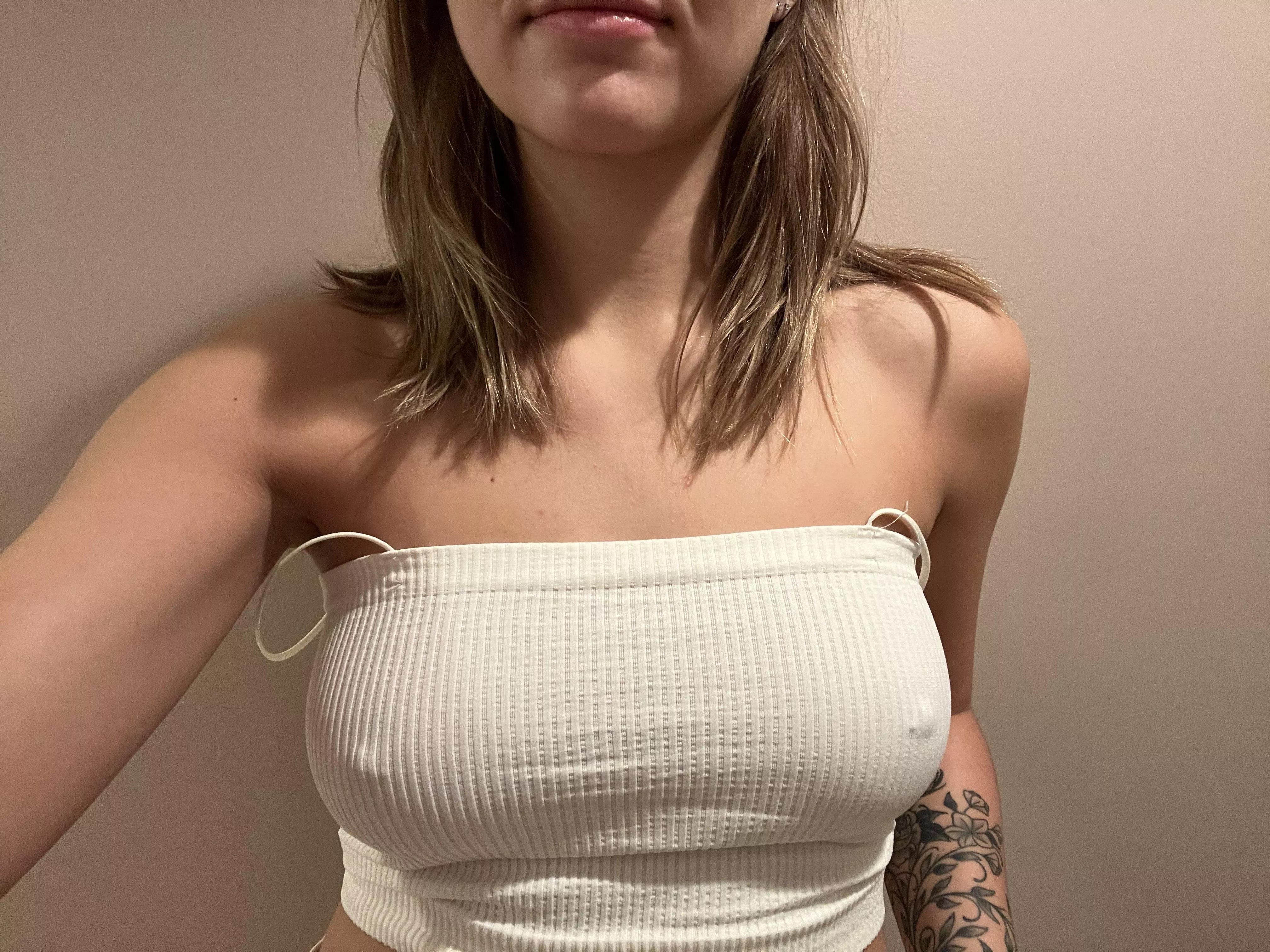 My wife wore this shirt to get her nipples pierced and it turned out her piercer was an old guy. Do you think he was hard when he saw her bare tits? I was allowed in the room 😅