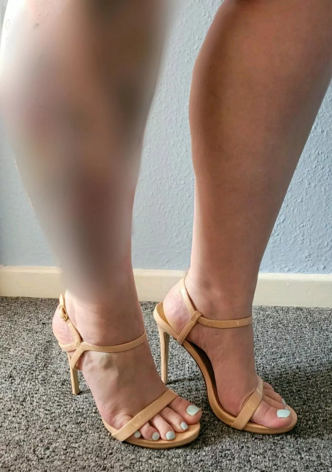 My wife's feet in my favourite of her shoes!