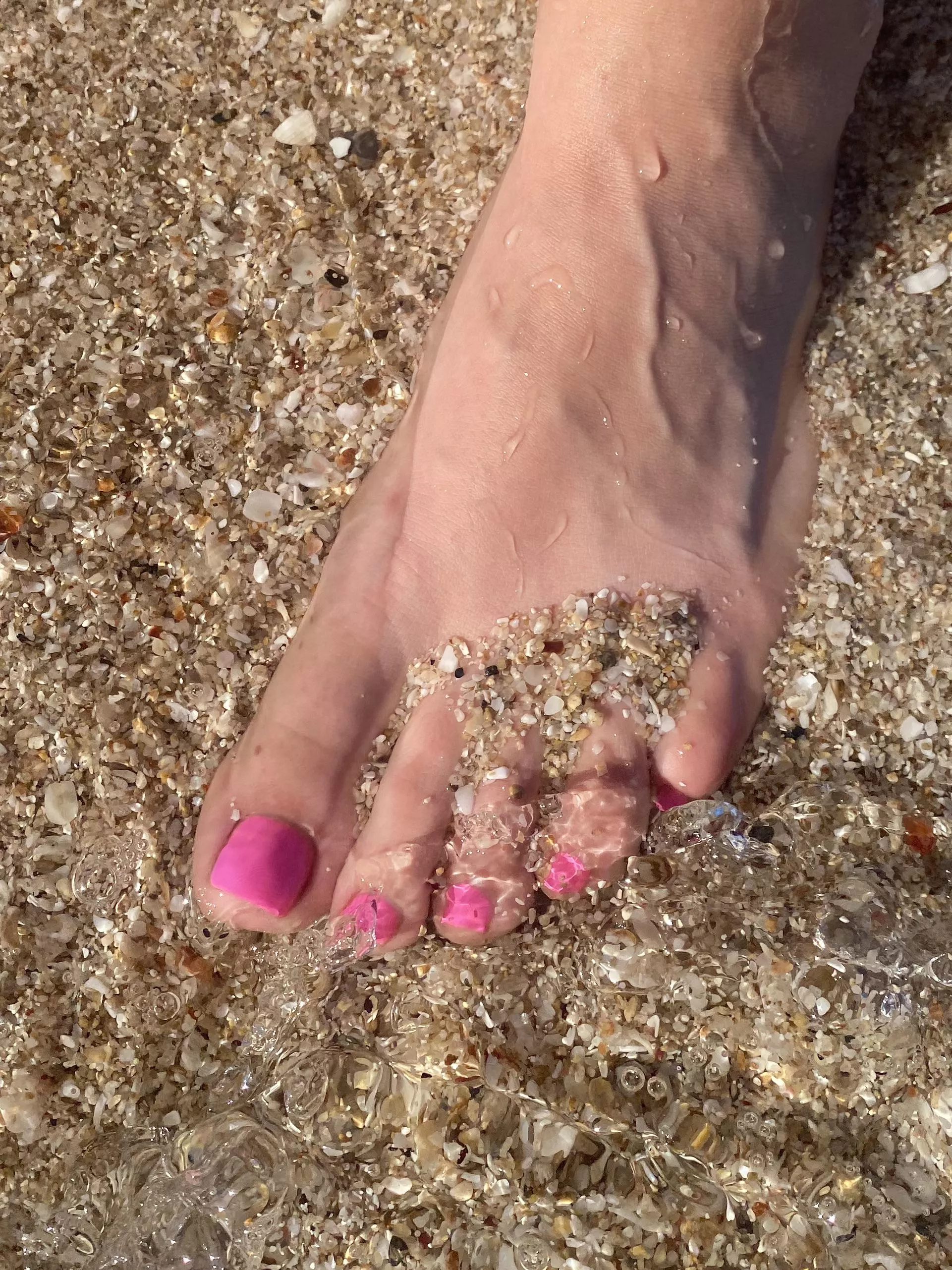 My wife’s pretty feet in Mexico.