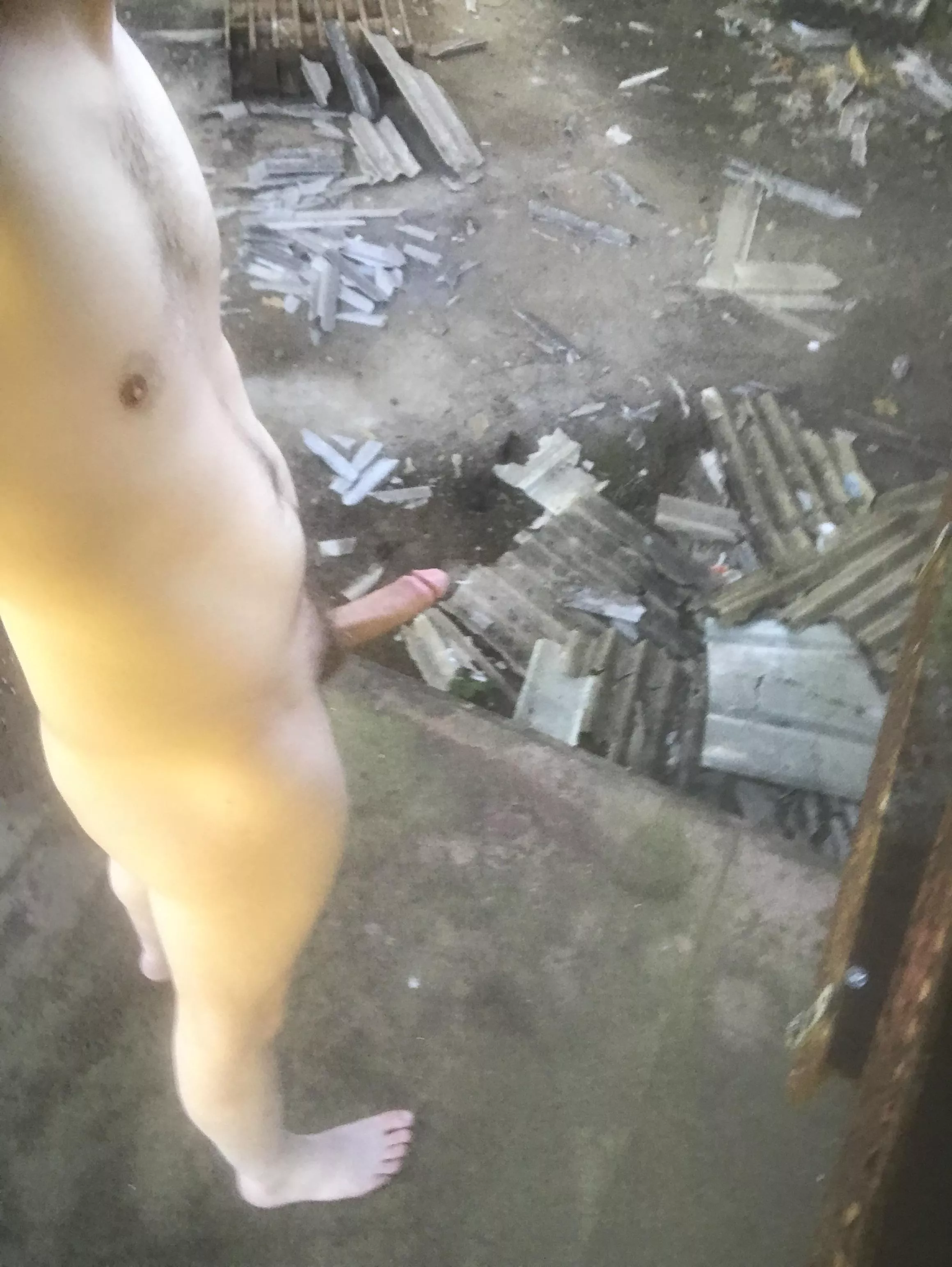 Naked in a abandoned building