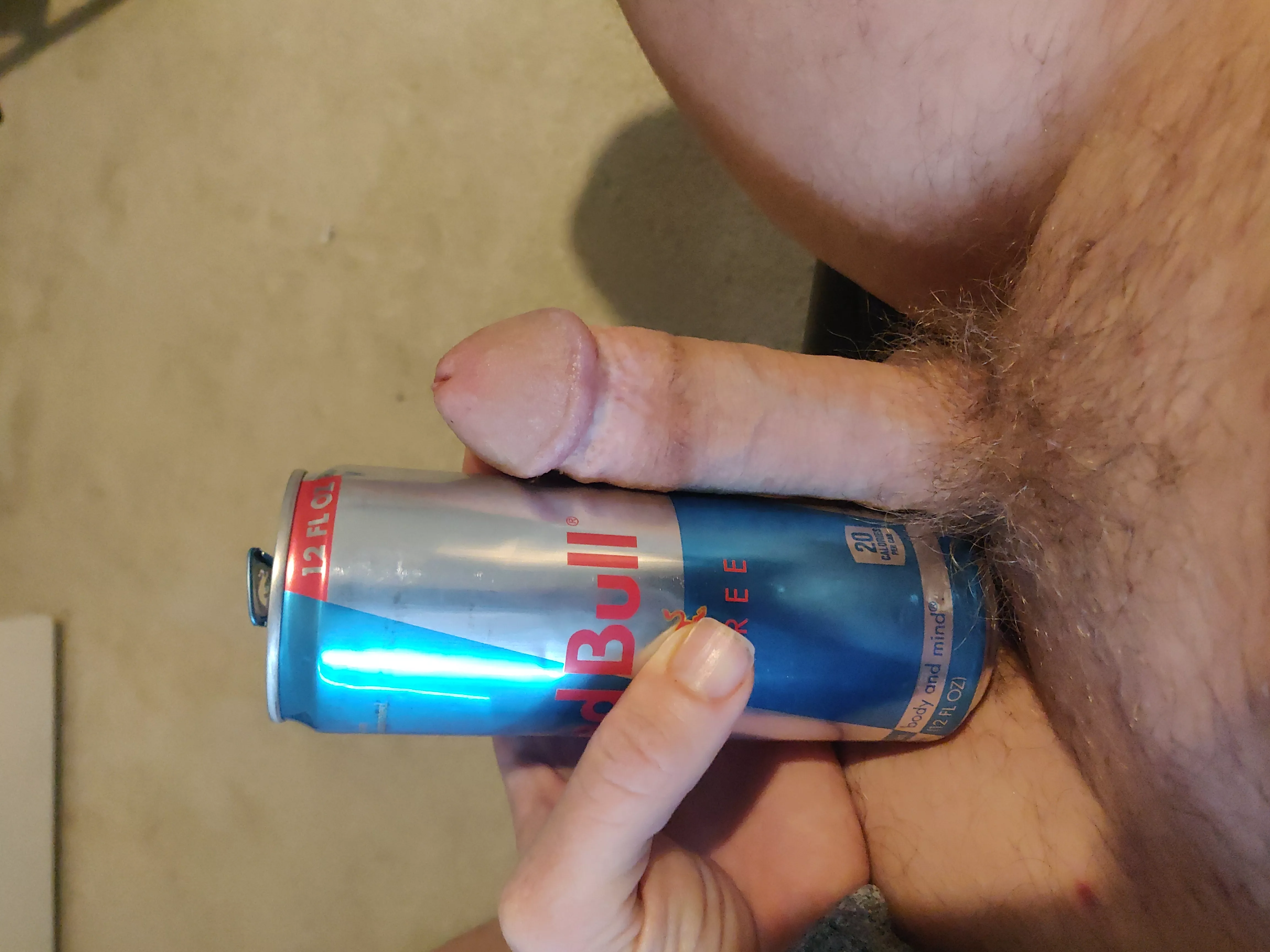 Next to can of red bull