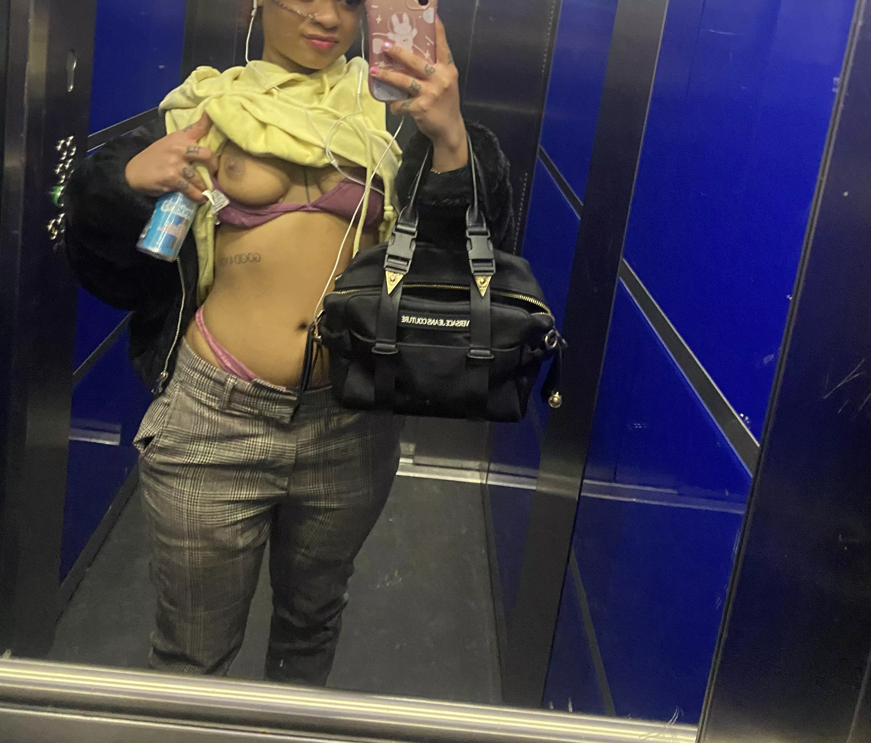 Oops my titty fell out in the elevator !