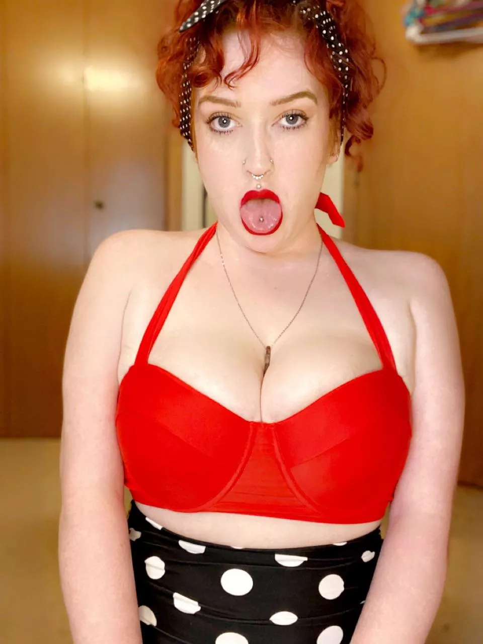 Pierced pinup tongue