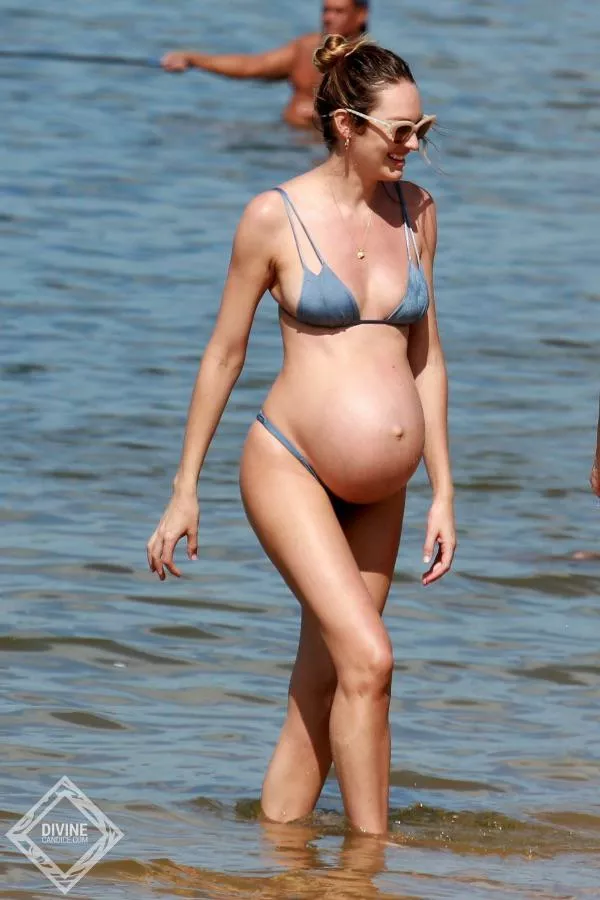 Pregnant Candice Swanepoel at the beach