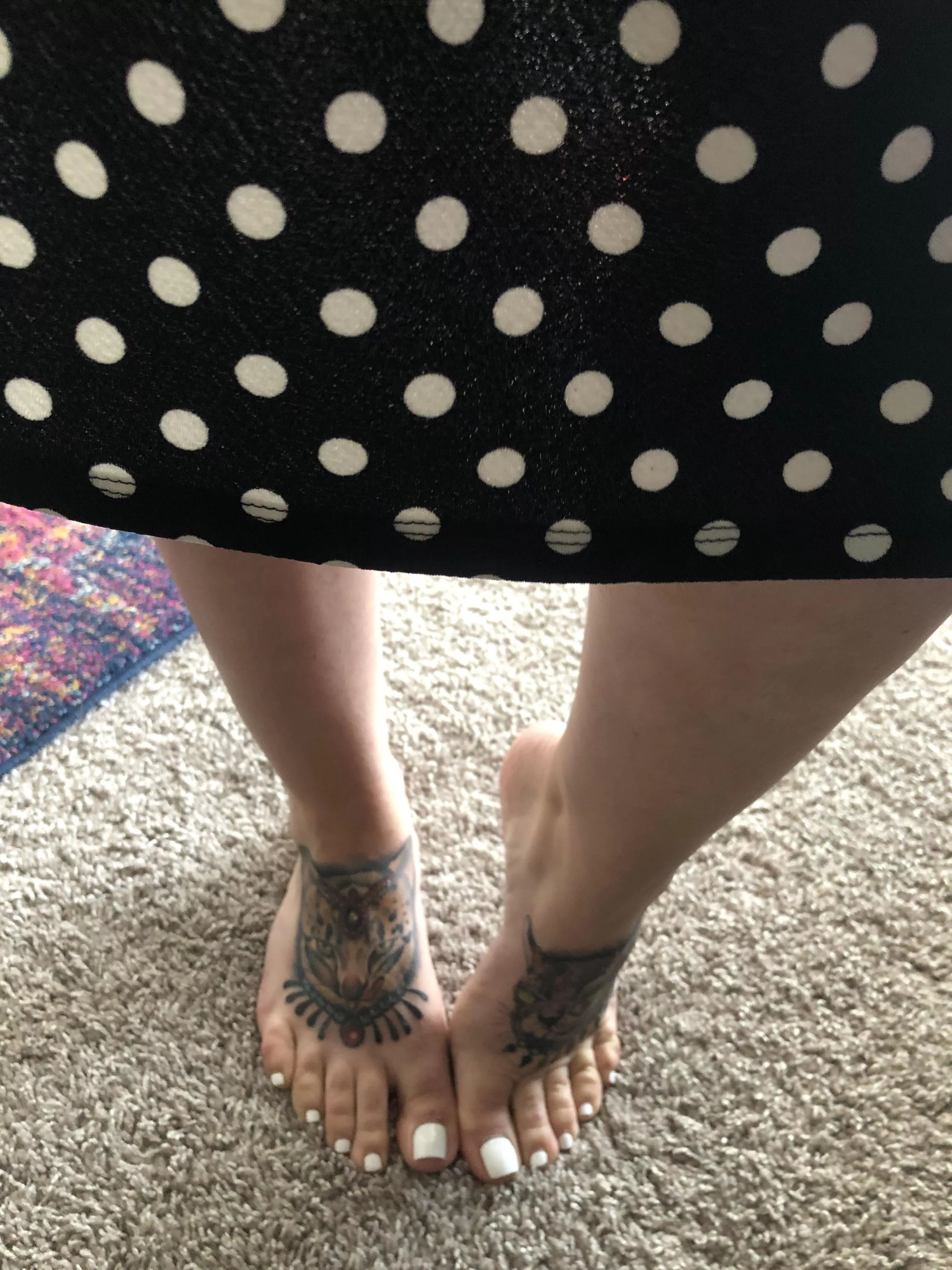 Pretty feet in a dress