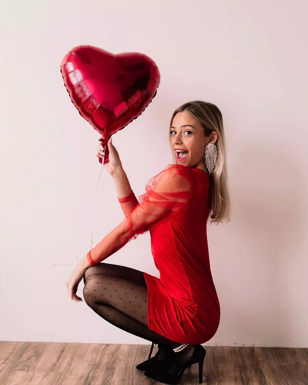 Red dress, black tights