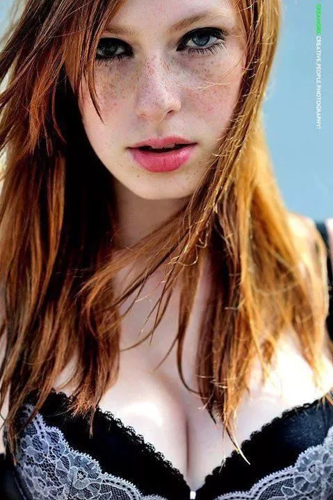 Red hair: check. Freckles: check. Cleavage: bonus!