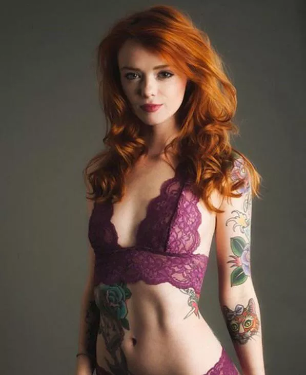 Red with tattoos