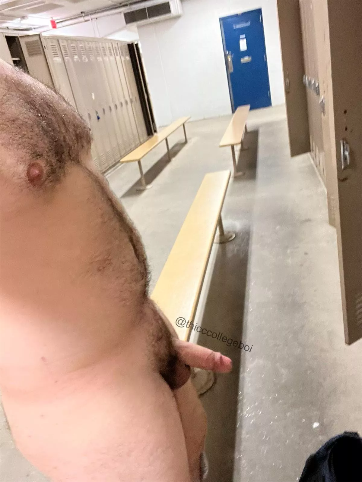 relaxing nude in the locker room after a workout