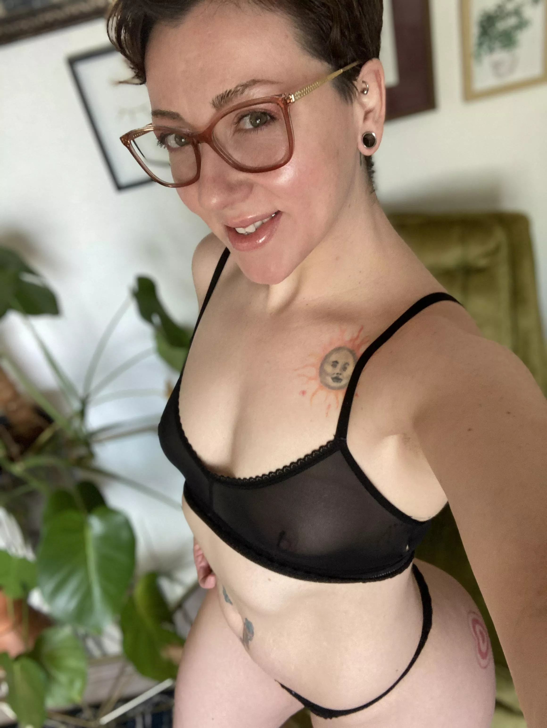 Short hair, glasses and some curves?