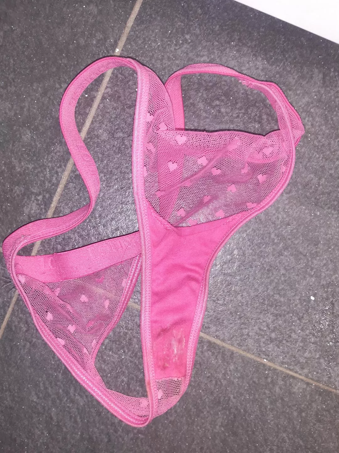 Still damp and sticky Pink thong