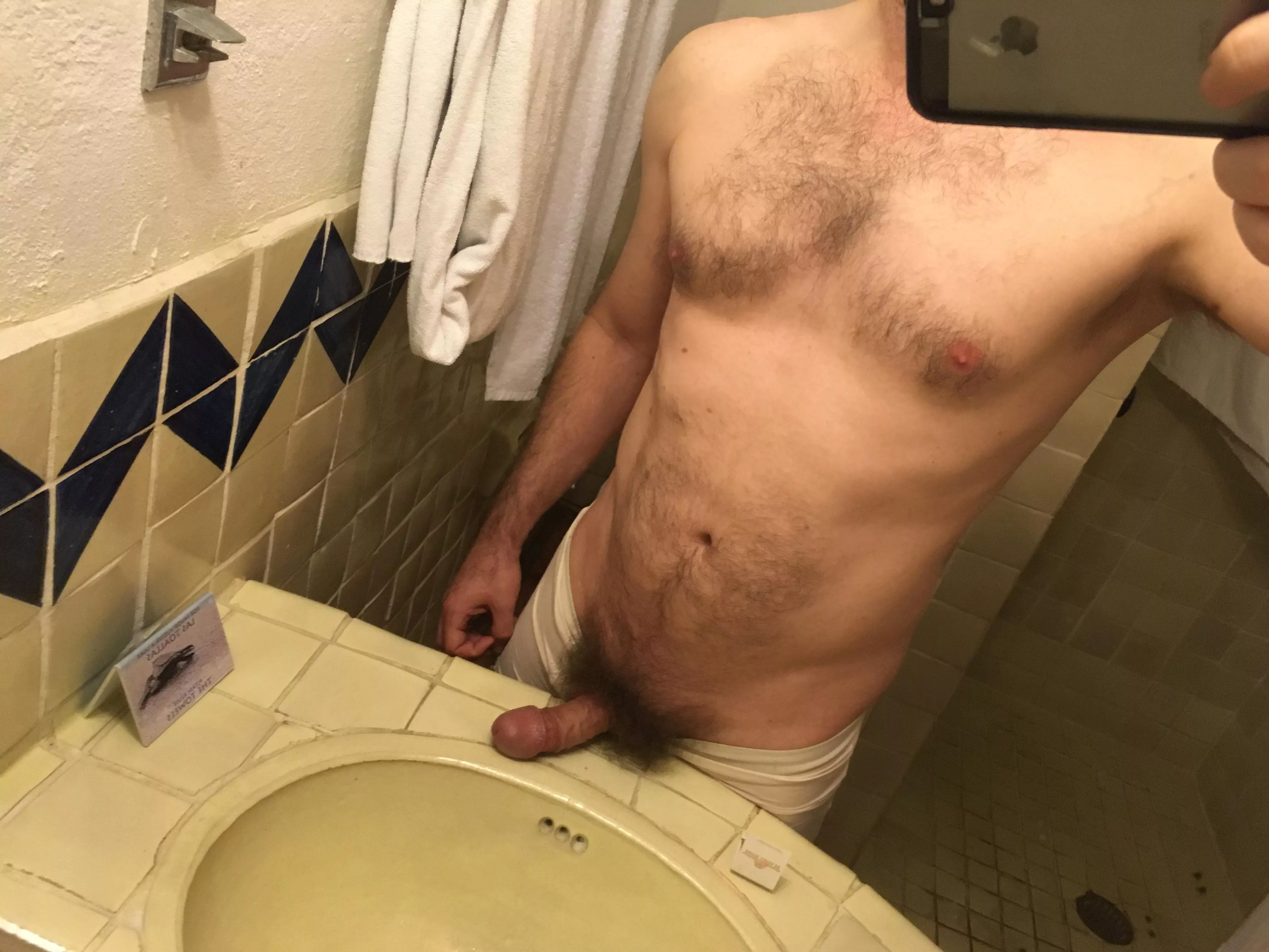 Stroking bush in the bathroom