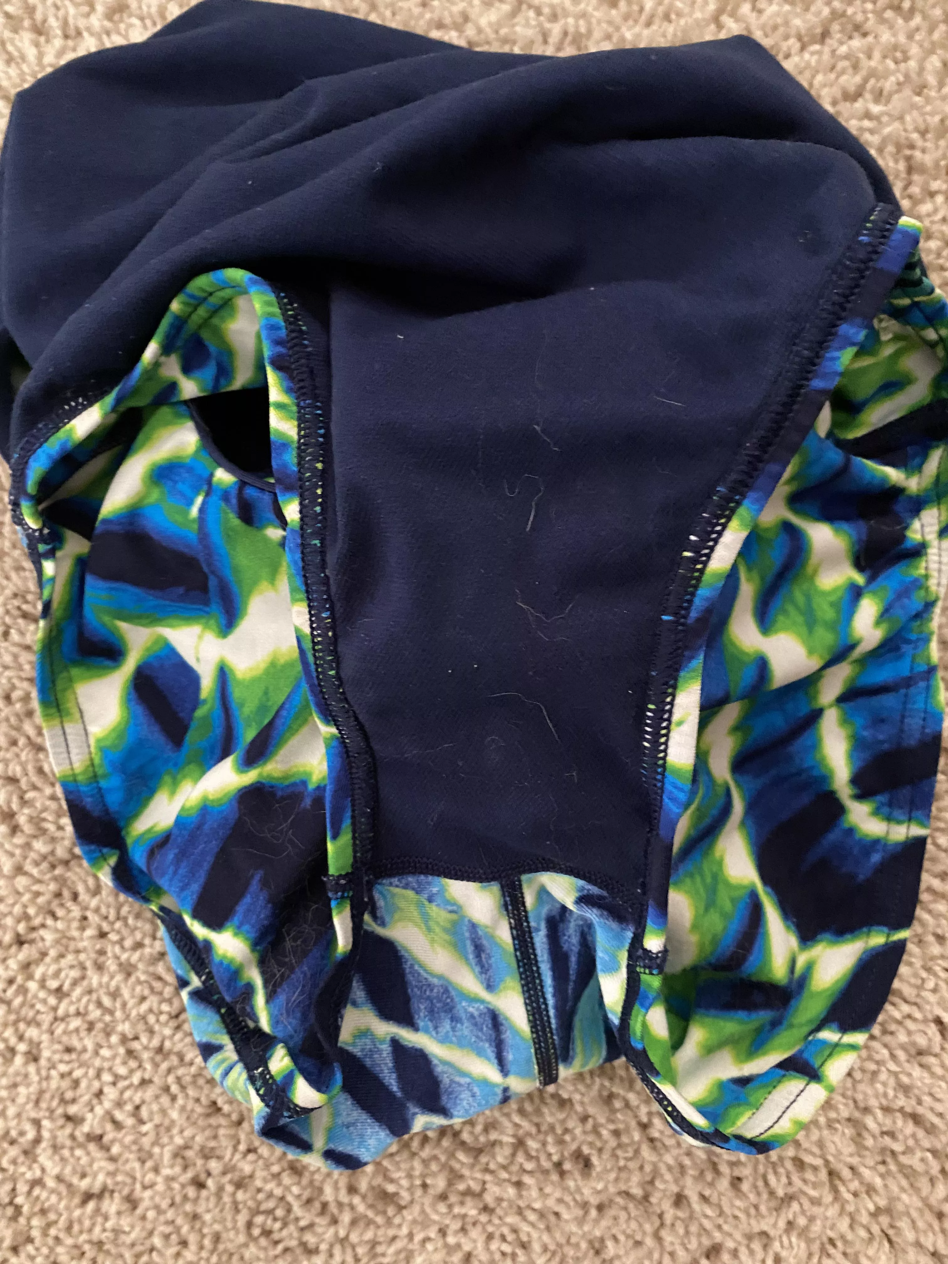 Swim Team Racing Swim Suit. Some Deep Stains and Leftovers.