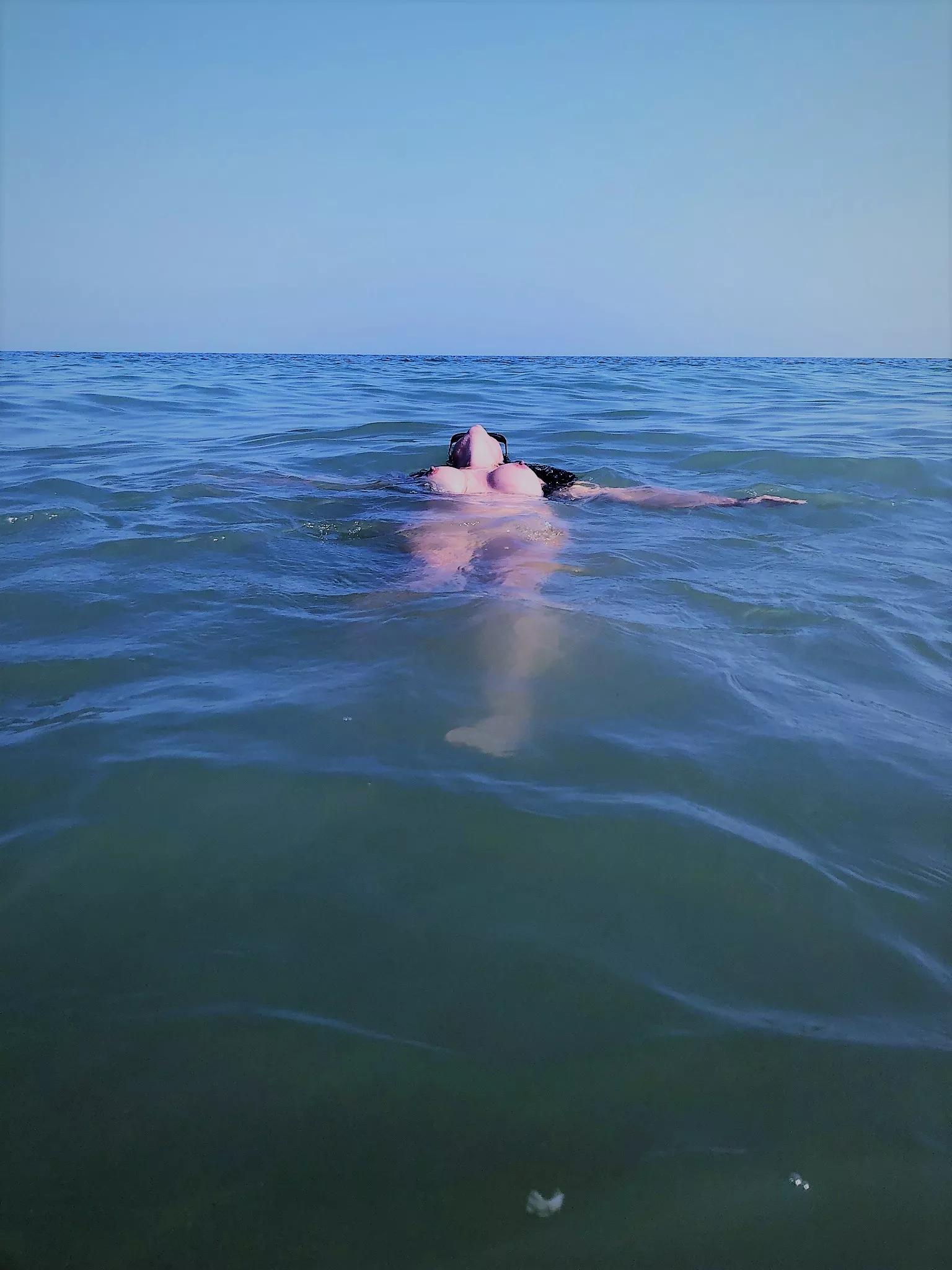 swimming naked on a public beach [f]