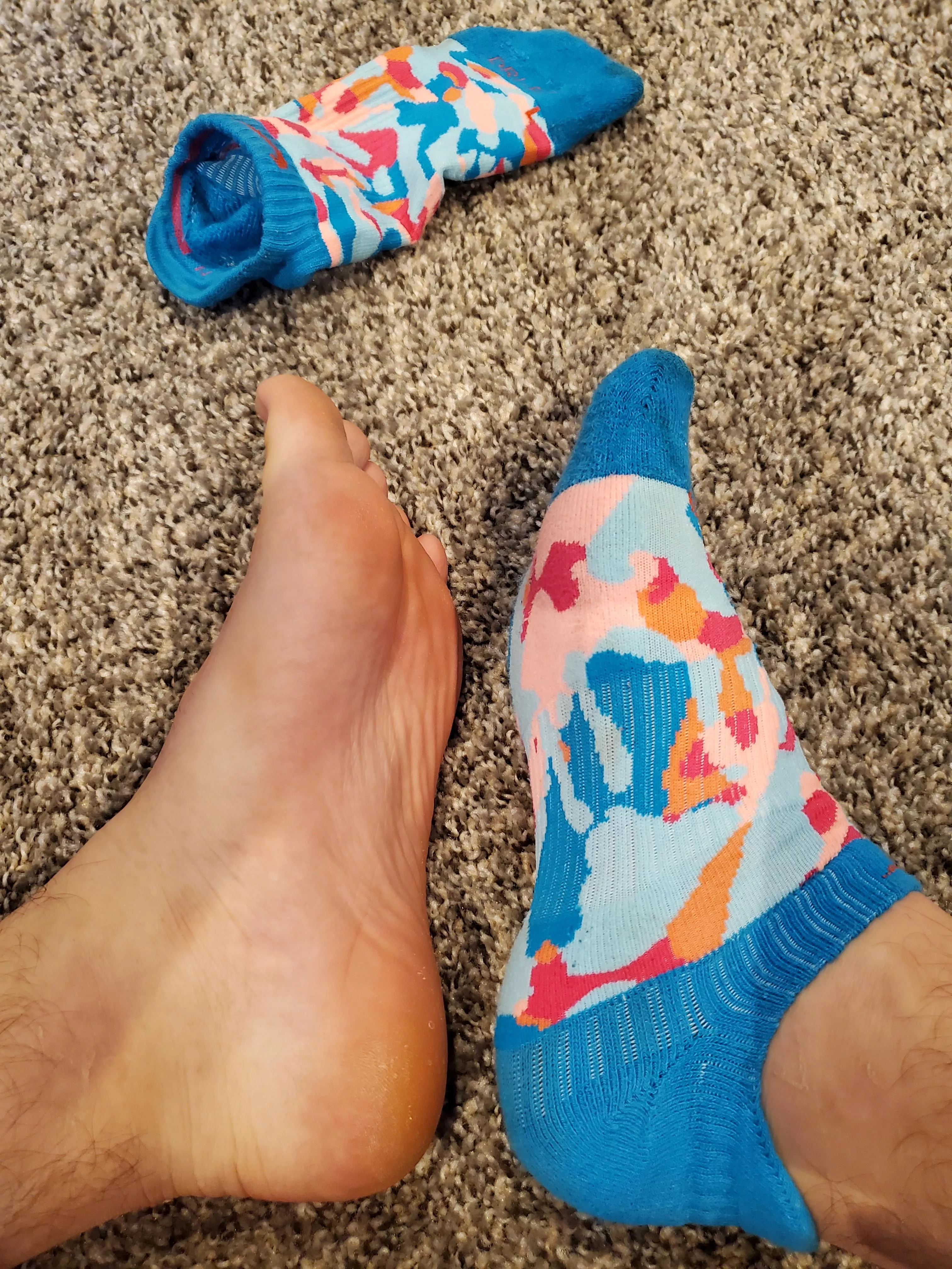 Taking my sweaty socks off after a run.