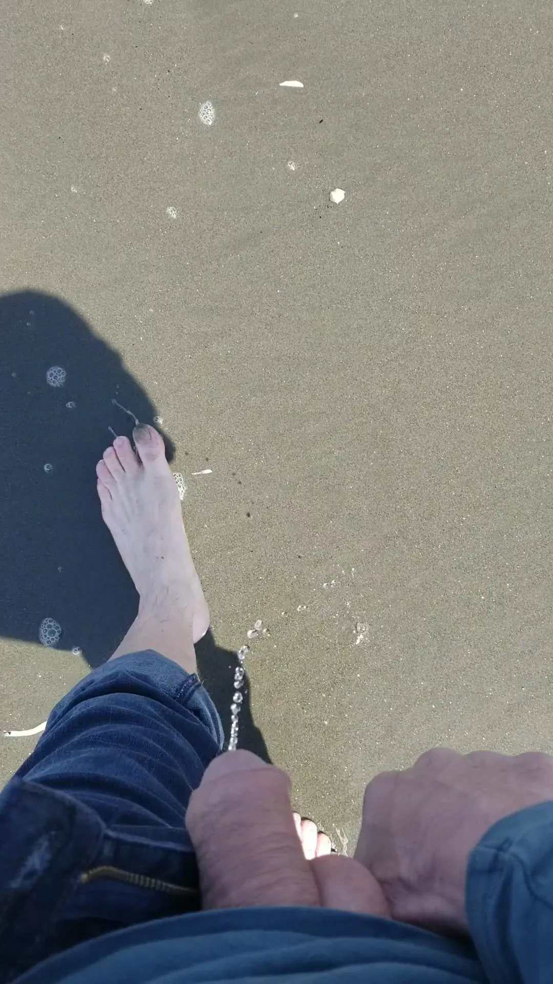 That sand isn't gonna wash itself off my feet.