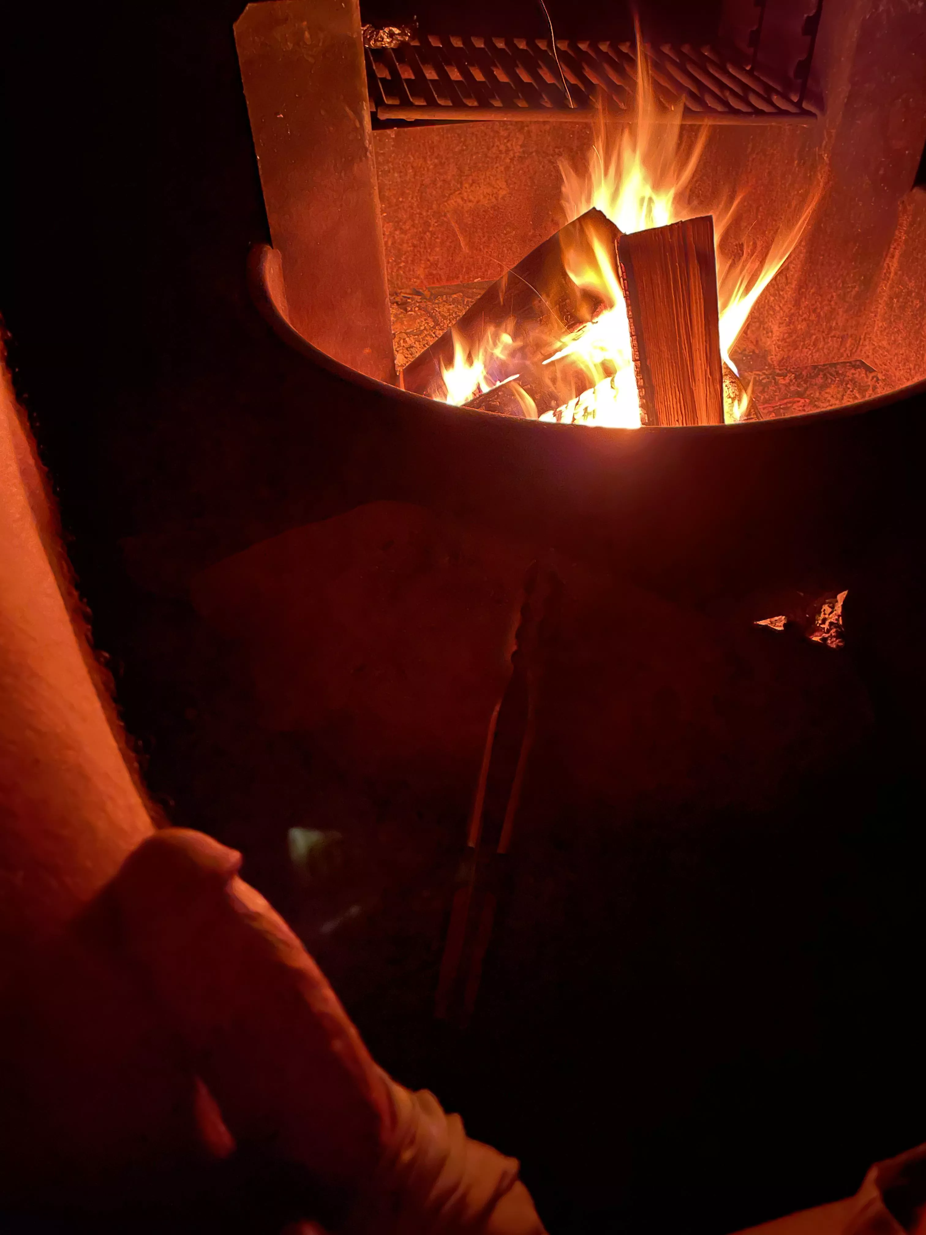 The heat of the campfire felt too good not to.