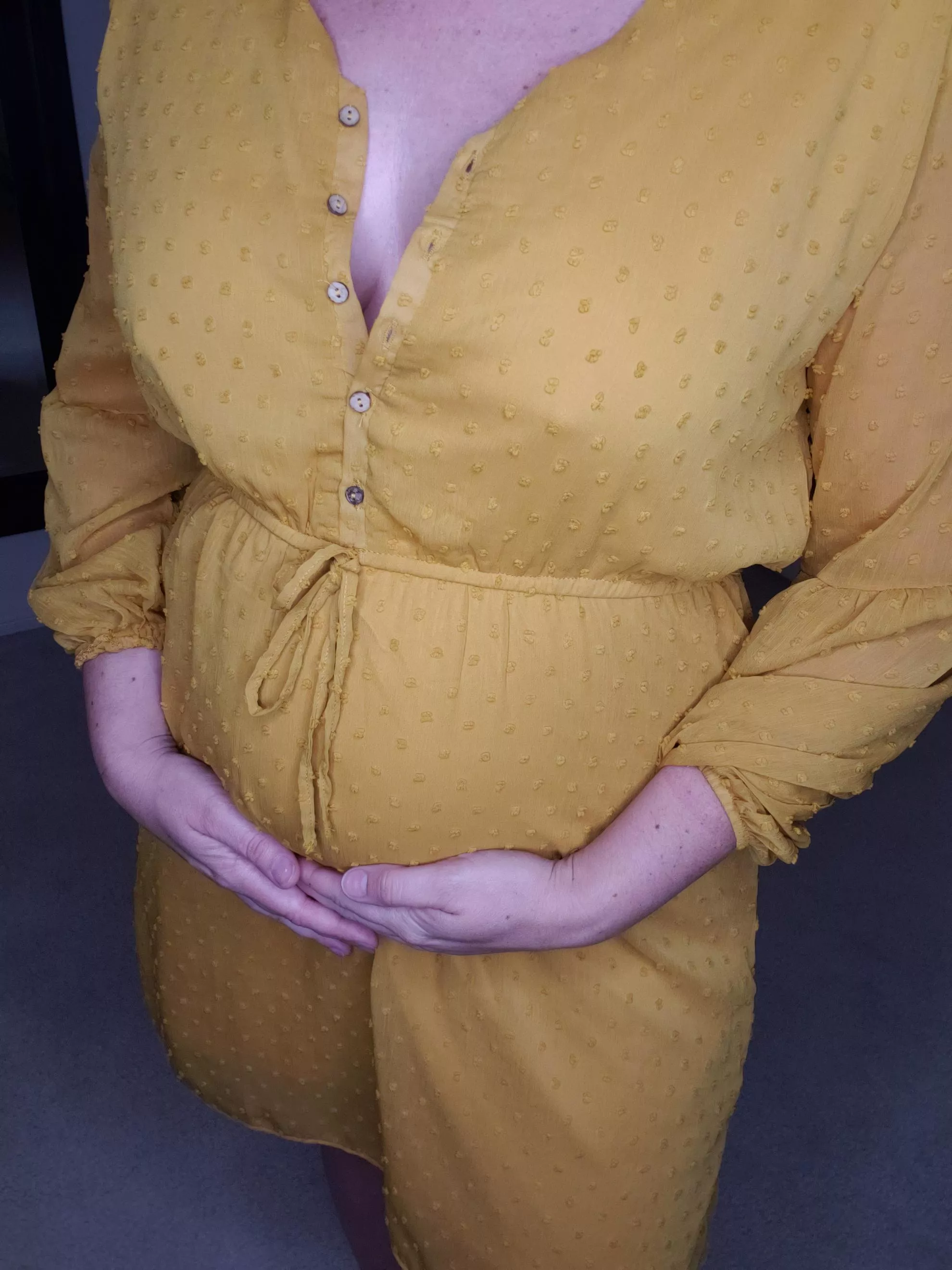 The only thing under this dress is a bump and a butt plug.