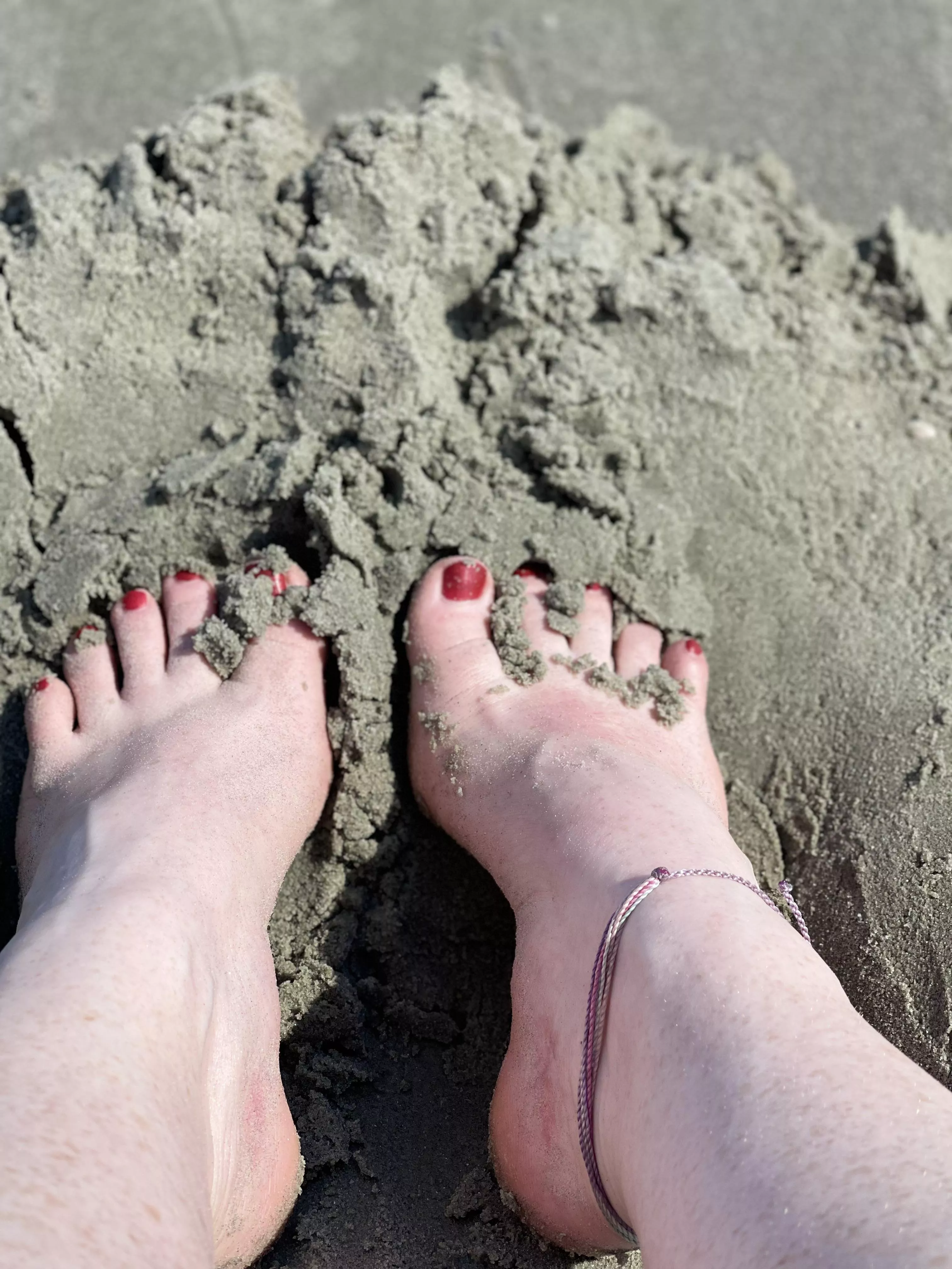 The sand feels so good in between my toes