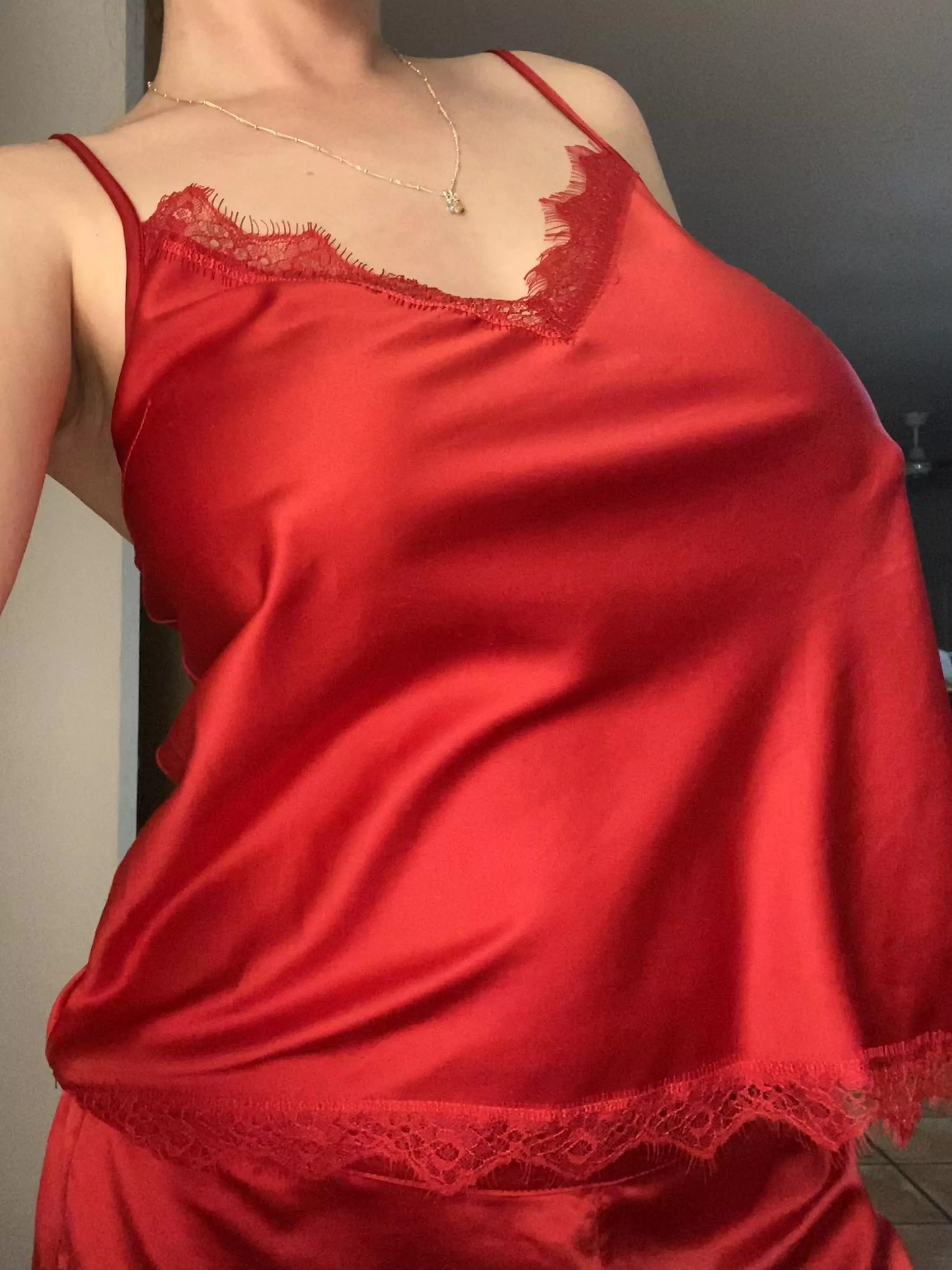 The warm lighting made the red silk look sensual [f]