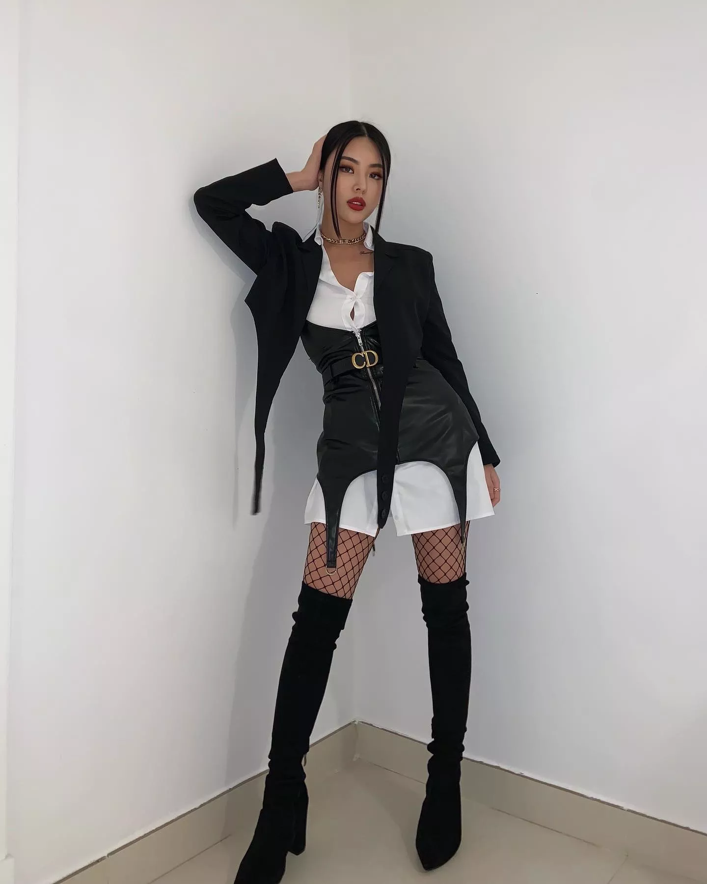 Thigh high boots and fishnets