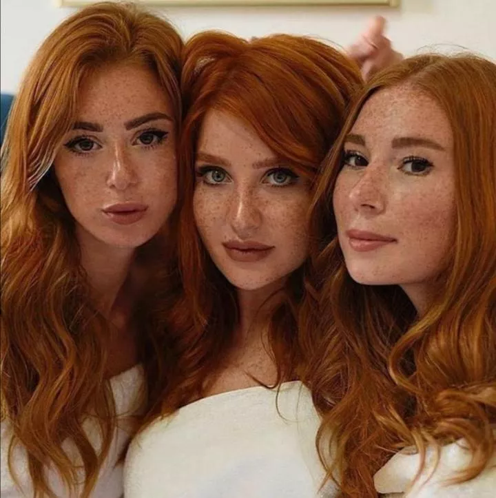 Three freckled redheads