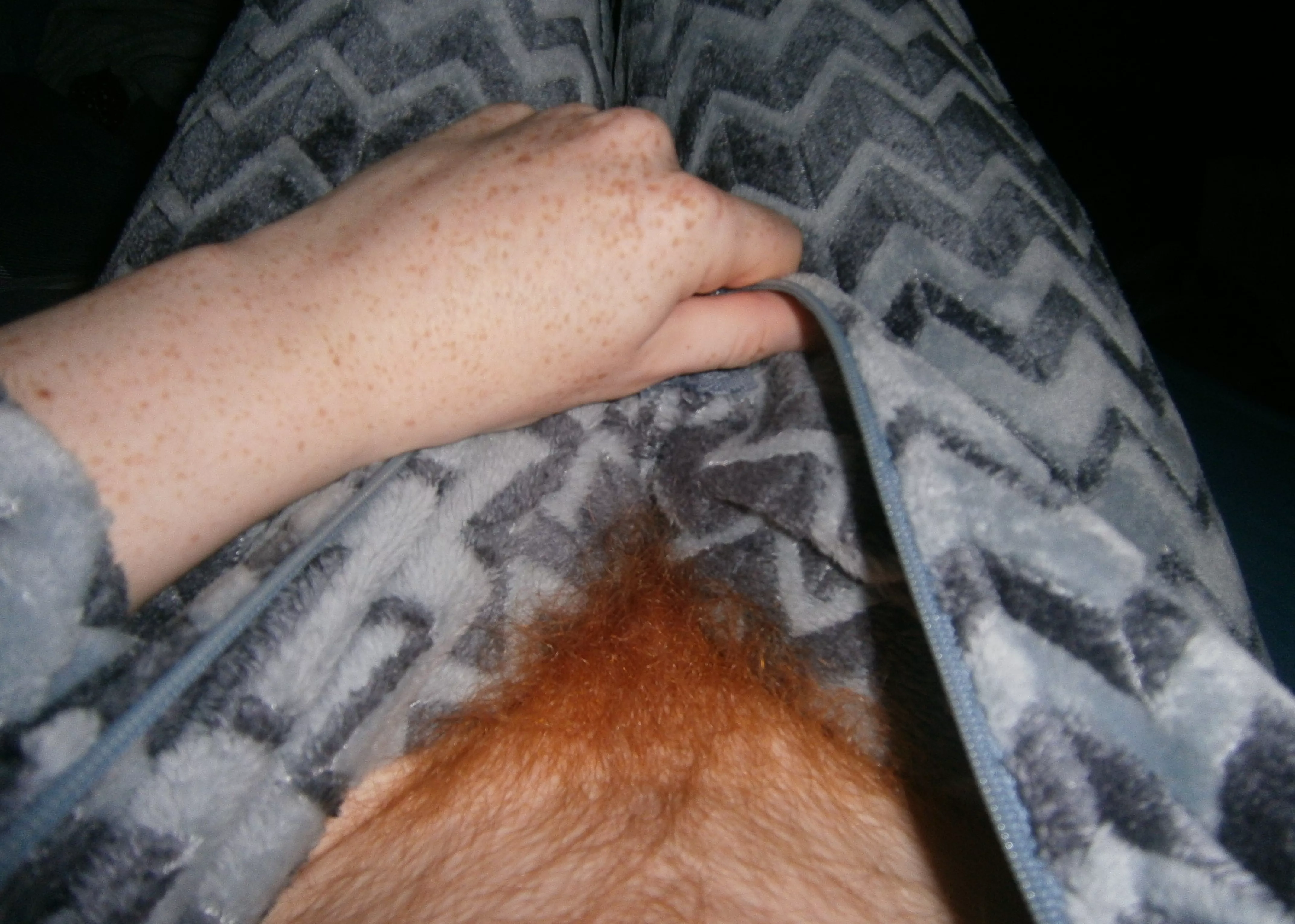 Unzipping my onesie to reveal my ginger bush :P