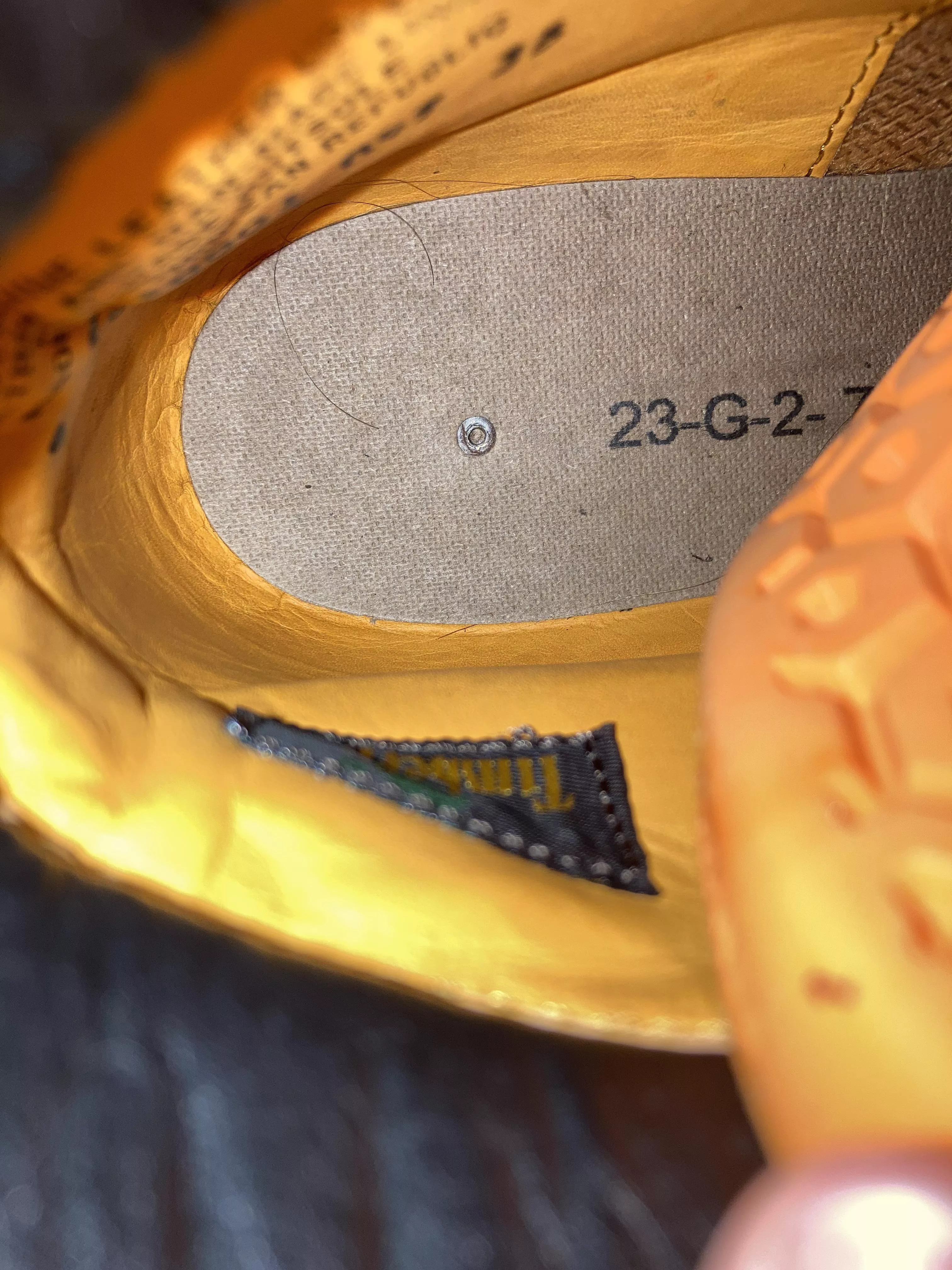 What is this hard wood-like material under the Insole of my premium timberland boot? And why is it there?