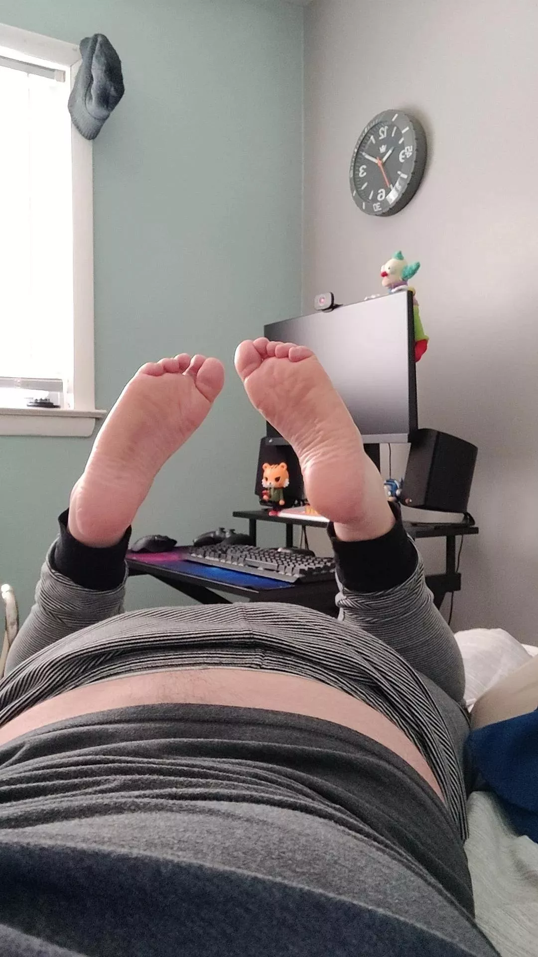 You're in my room gaming on my computer and notice these soles waving at you. What are you doing to them?