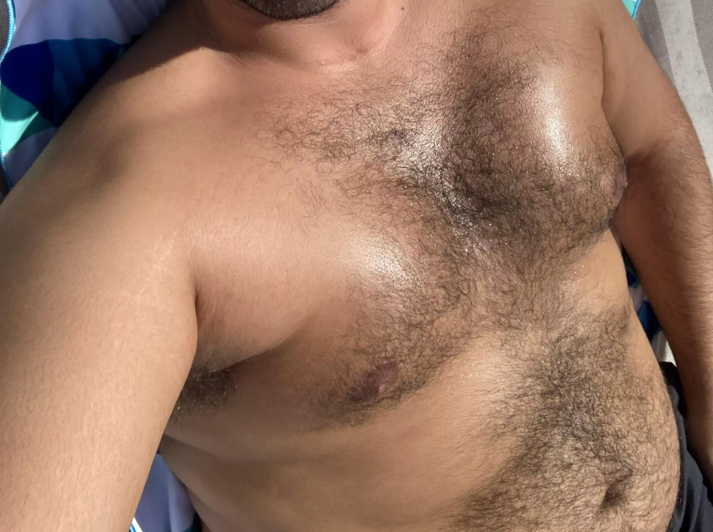 (25yo) Might skip next years trim, the hair seems to compliment my new bear body and tan!