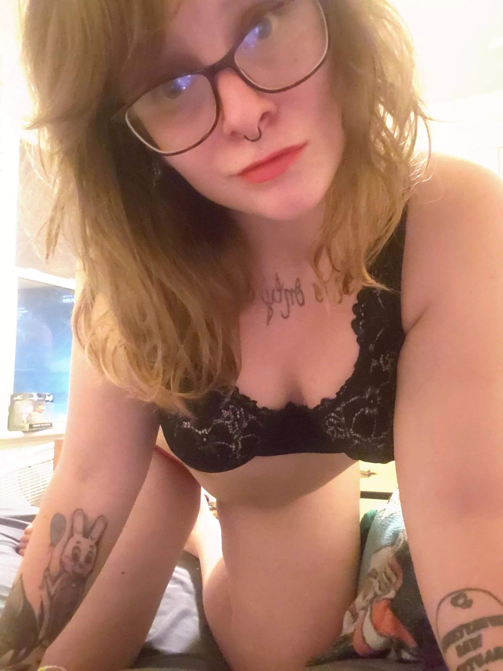 29 year old with tattoos and glasses