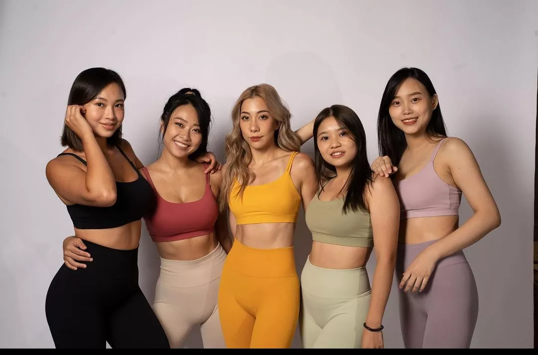 A sexy set of Asians in yoga gear. What's not to love.