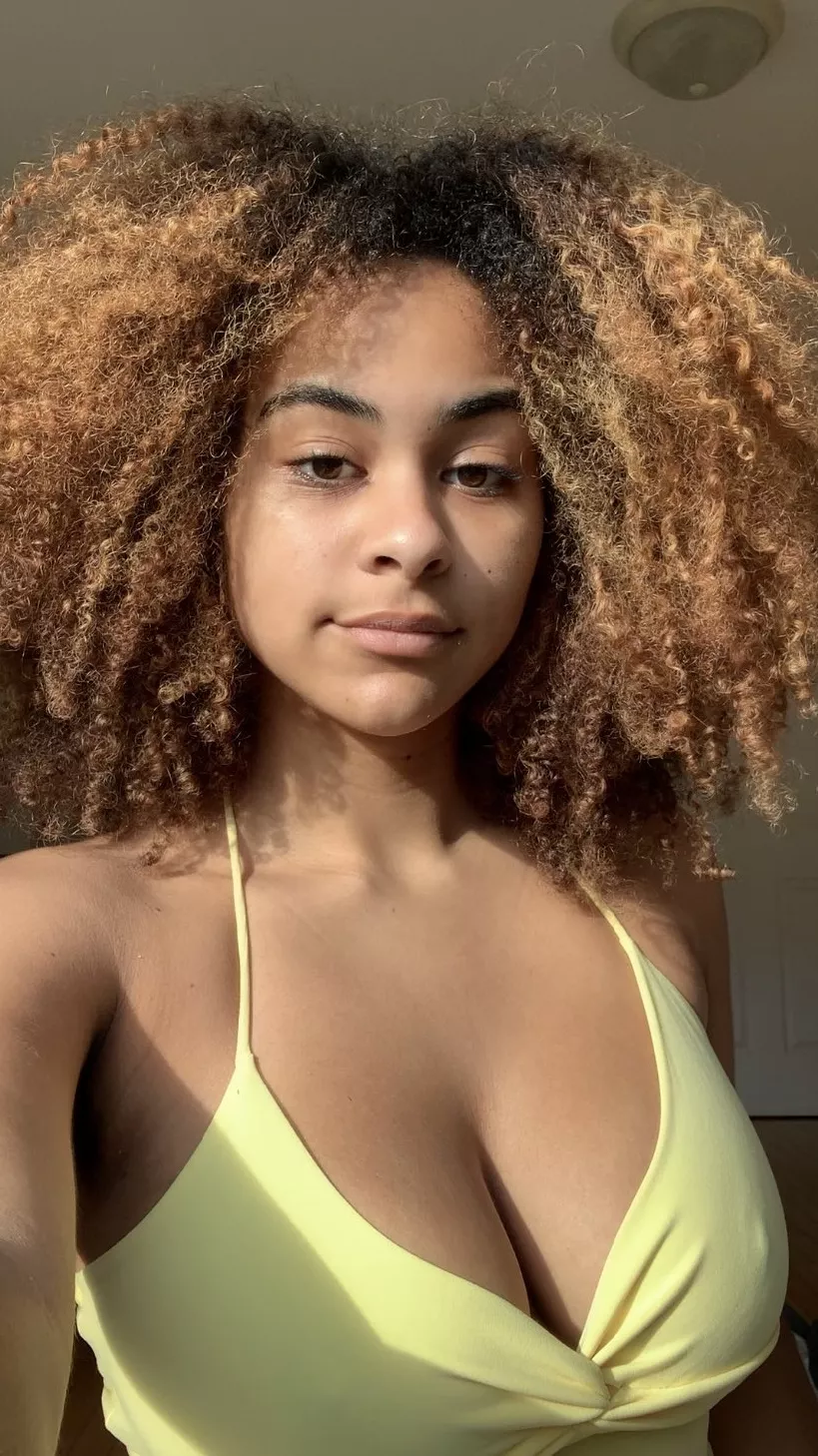 Afro and cleavage