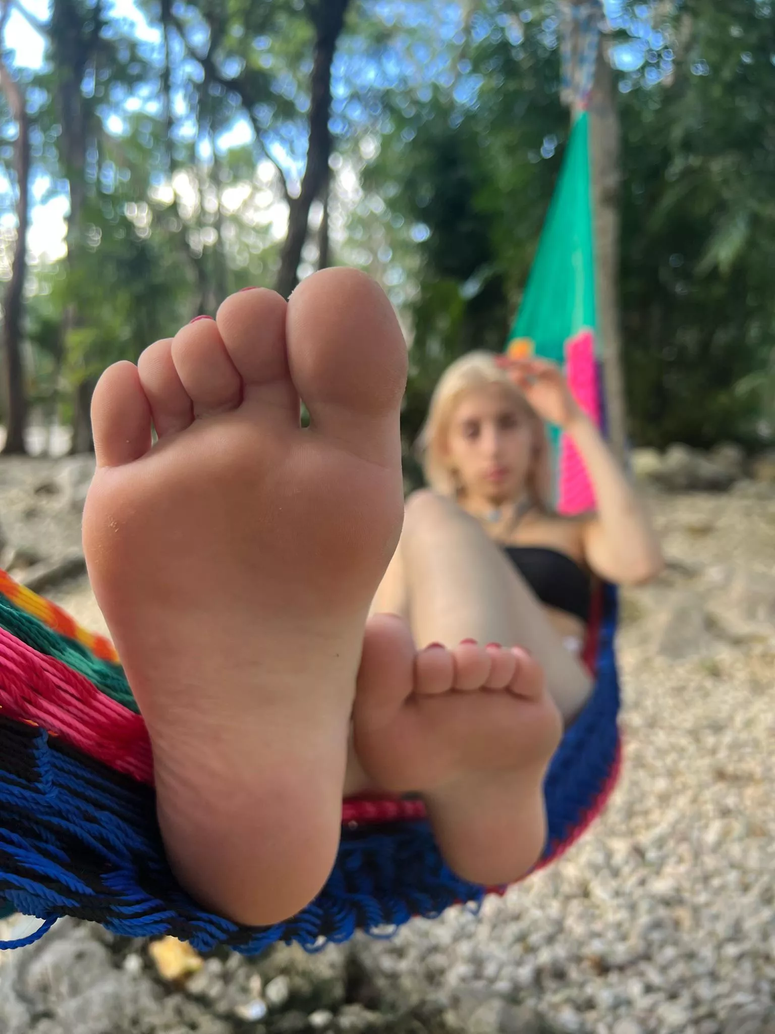 Any volunteers to lick clean my sandy feet?