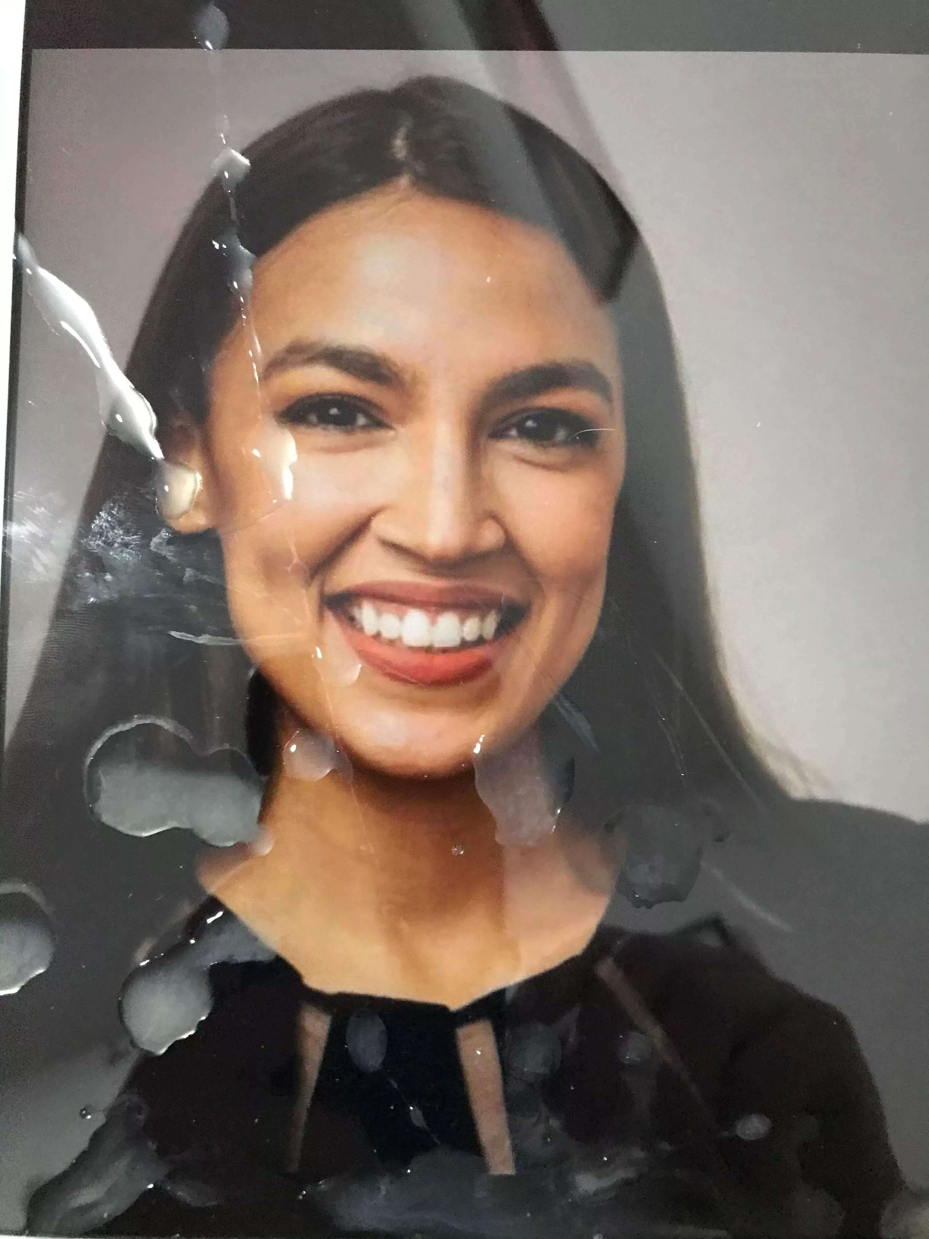 AOC looks prettier with a load of cum on her face