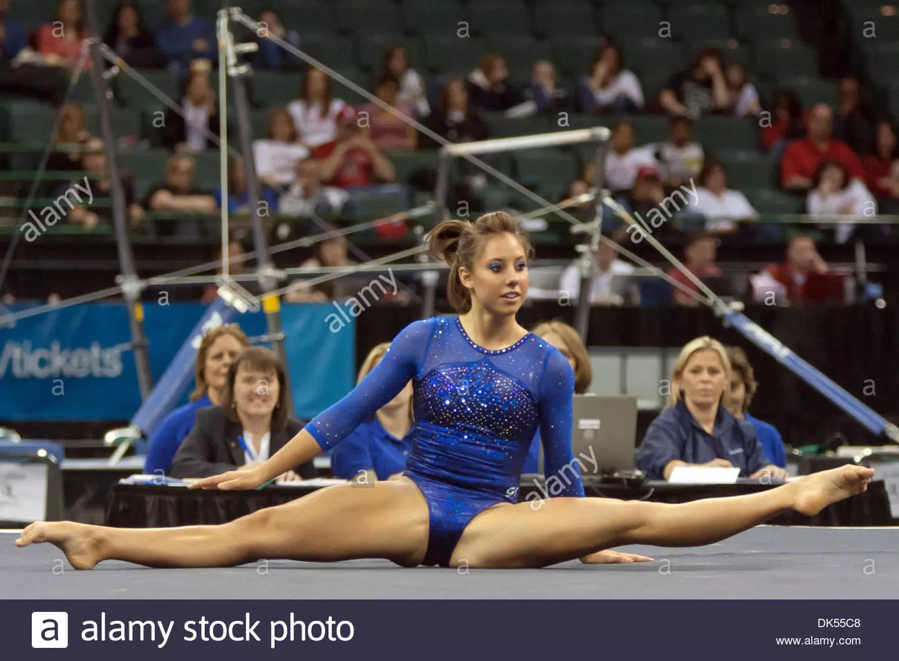 Artistic gymnast Alaina Johnson spreading her legs