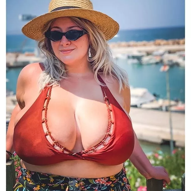 Big blonde stuffed into a bikini top