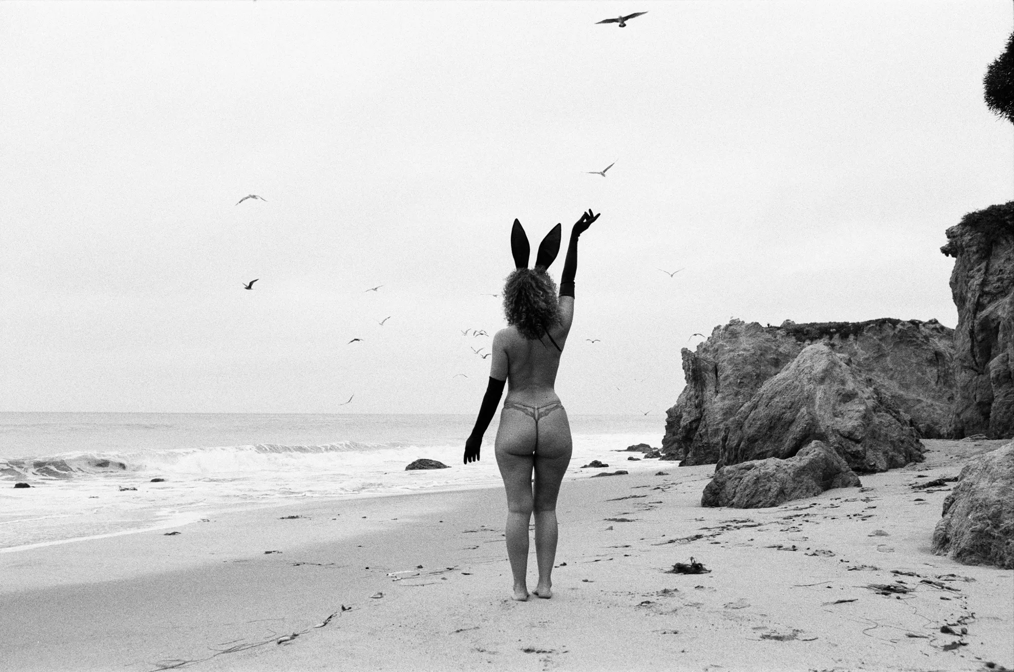 Black and white 35mm film photography on the beach at 6am ðŸ’•