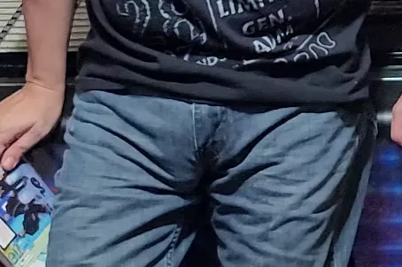 Blue jeans bulge and maybe a cock head if you look closely enough