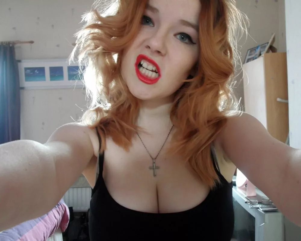 Busty Christian redhead